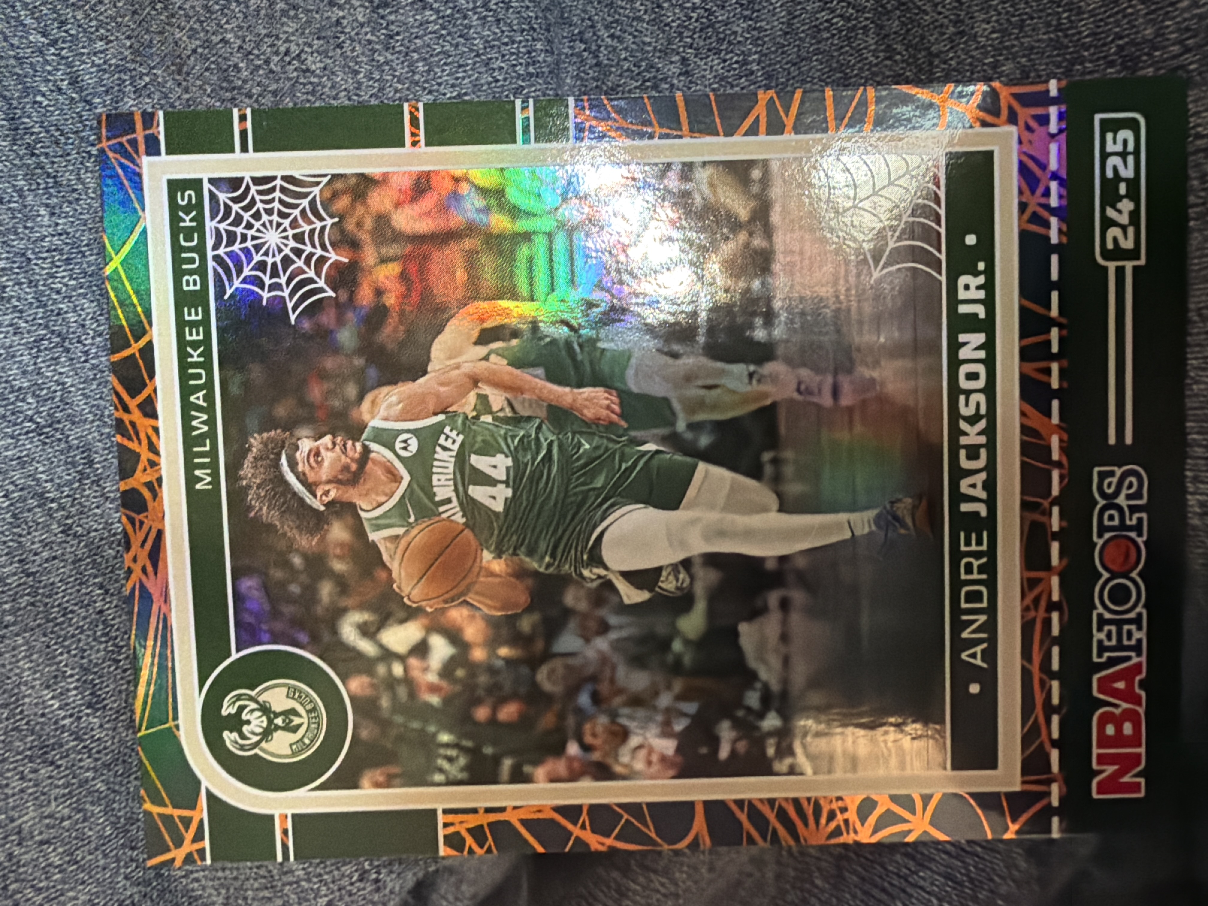 Andre Jackson Jr. 2024-25 NBA Hoops Haunted Hoops Holo Webs Holo Webs Near Mint - Trading Card Image