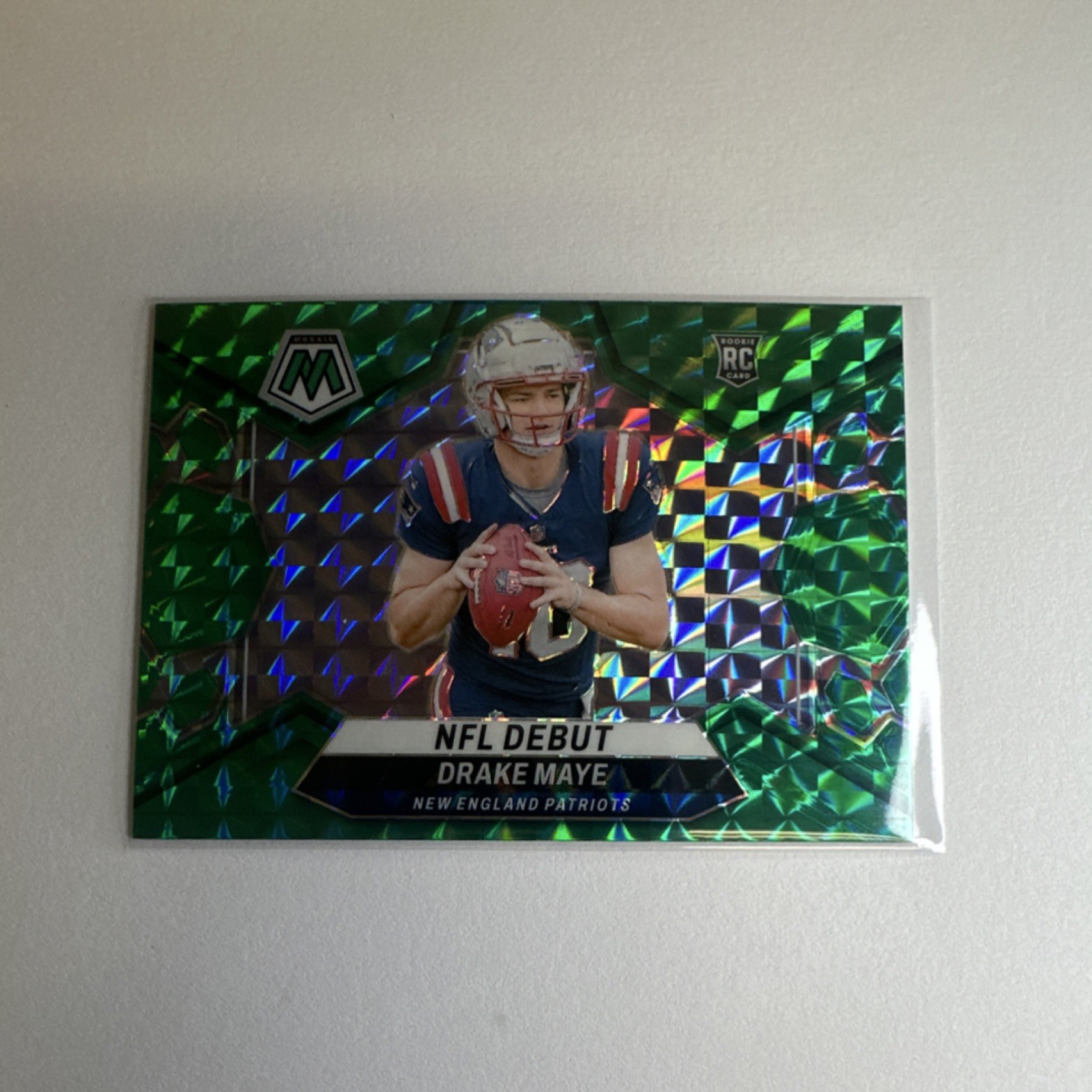 Drake Maye 2024 Panini Mosaic NFL Debut Green Mosaic Prizm Rookie Card Green Mosaic Prizm - Trading Card Image