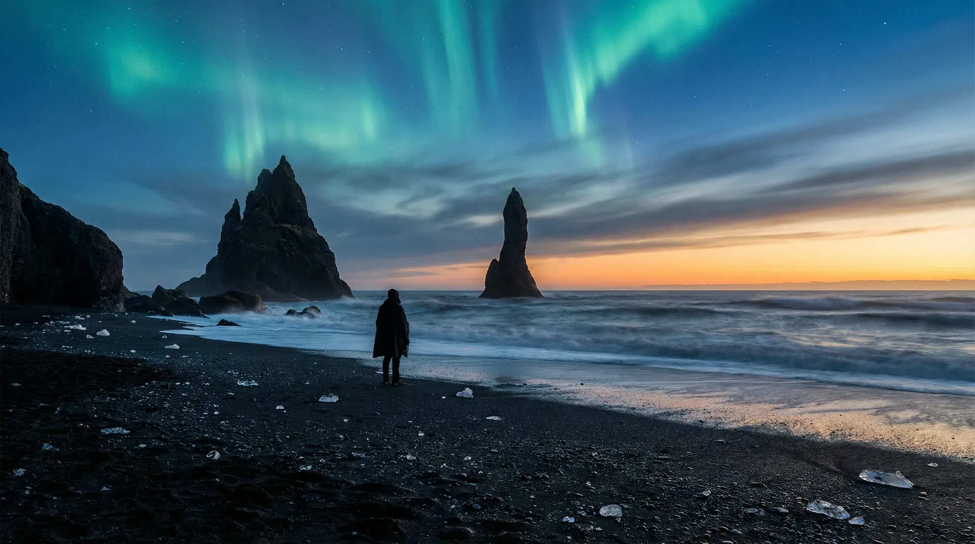 Iceland black sand beach with aurora borealis