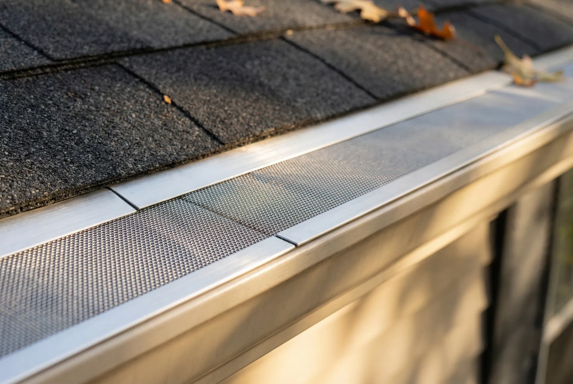 Premium gutter guards installed on residential roof