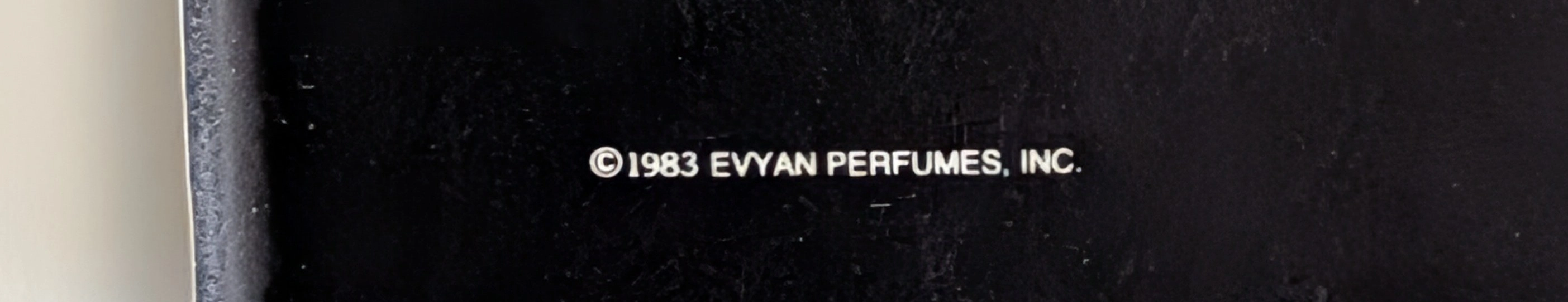 The Time Traveller’s Dossier: 1983 Evyan White Shoulders Vintage Advertisement — An Ode to Classical Romance and Elegance — The Record Institute Journal