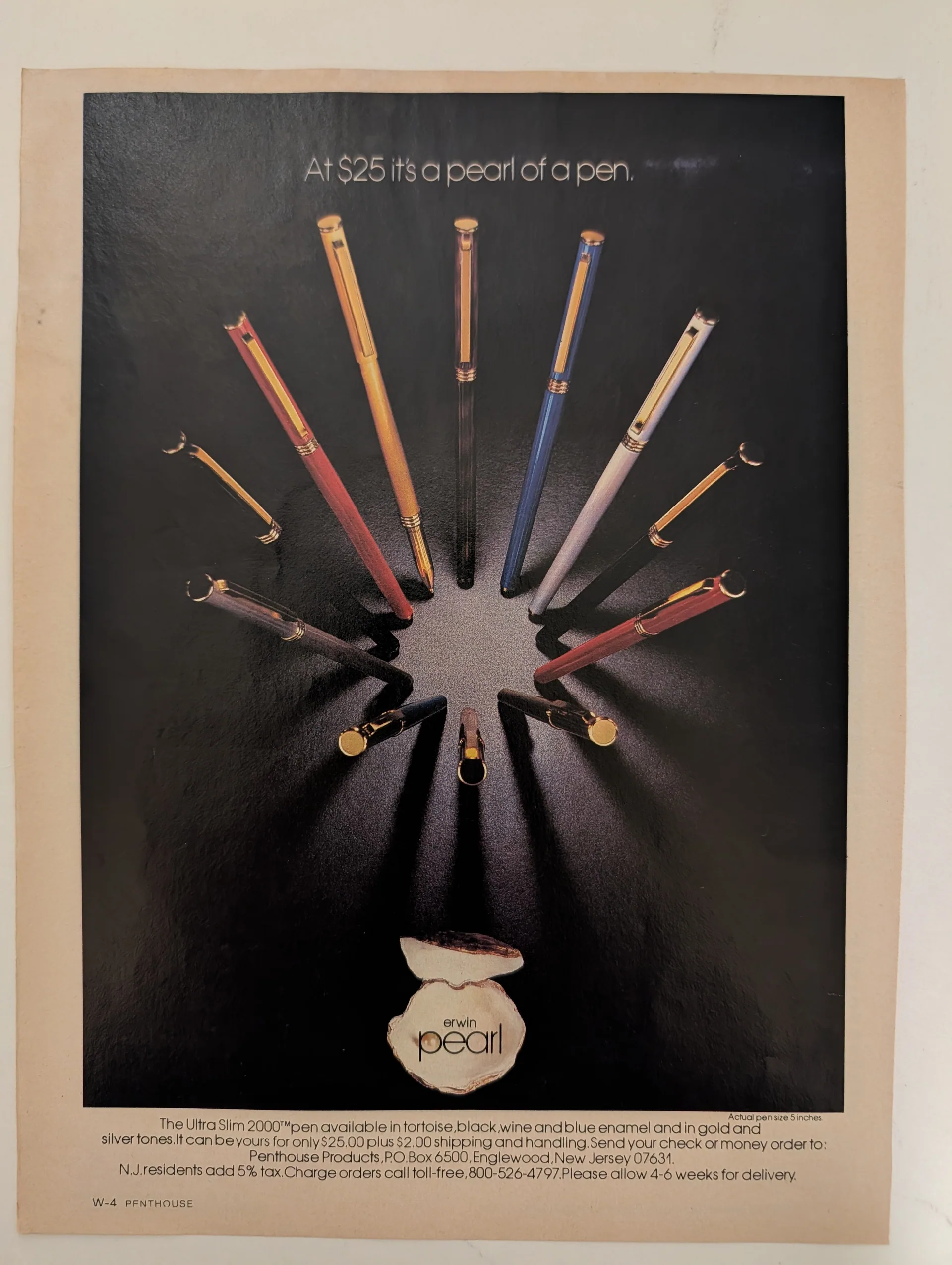 Magazine advertisement for the erwin pearl Ultra Slim 2000 pen: slim pens in several finishes radiate from a central bright point across a black field, with the headline "At $25 it's a pearl of a pen"