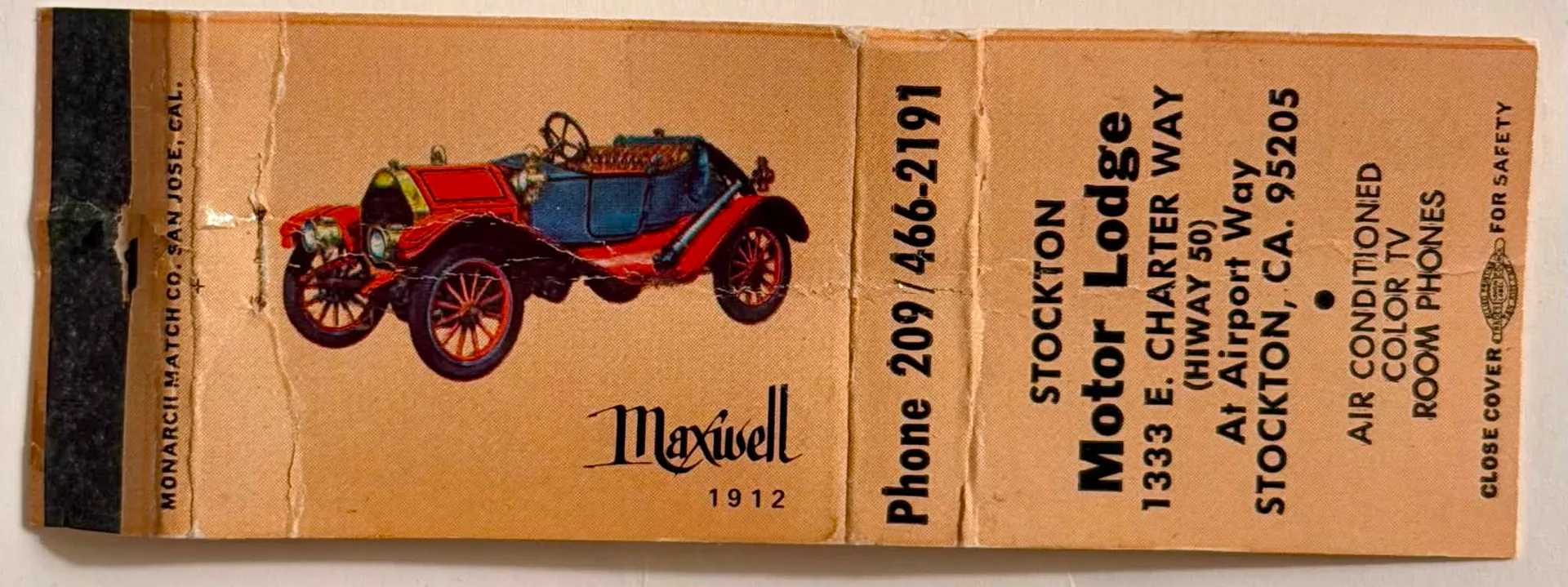 A flattened, vintage tan matchbook cover for the Stockton Motor Lodge. The left side features a vibrant illustration of a red and blue 1912 Maxwell open-top automobile. The right side displays the motel's address at 1333 E. Charter Way in Stockton, California, and lists amenities like "Air Conditioned," "Color TV," and "Room Phones." The spine includes the phone number "209/466-2191," and the manufacturer edge reads "MONARCH MATCH CO. SAN JOSE, CAL."