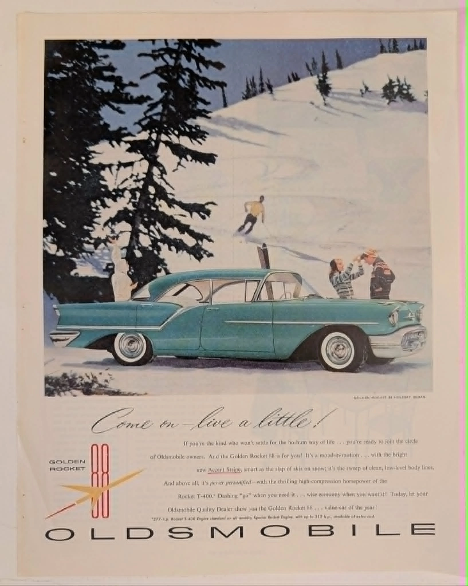 1957 Oldsmobile Golden Rocket 88 Holiday Sedan vintage advertisement.