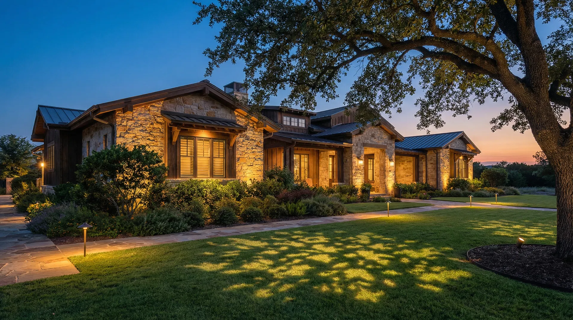 Beautifully illuminated luxury home at twilight in Norman Oklahoma