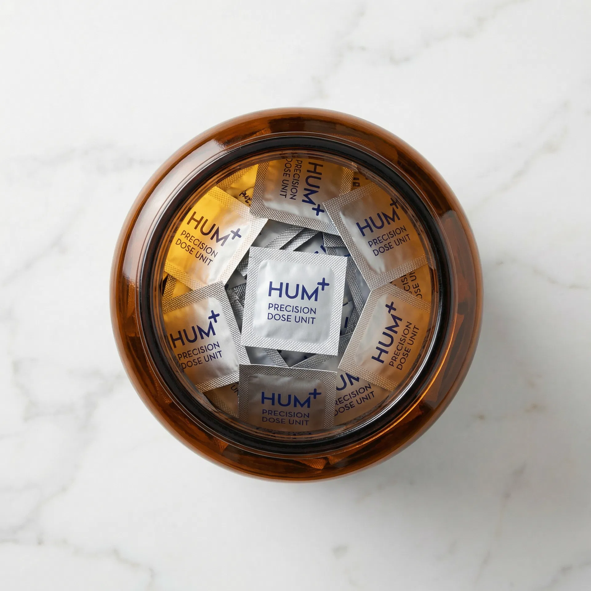 HUM+ complete product system — foil packet and pharmaceutical vial with prescription