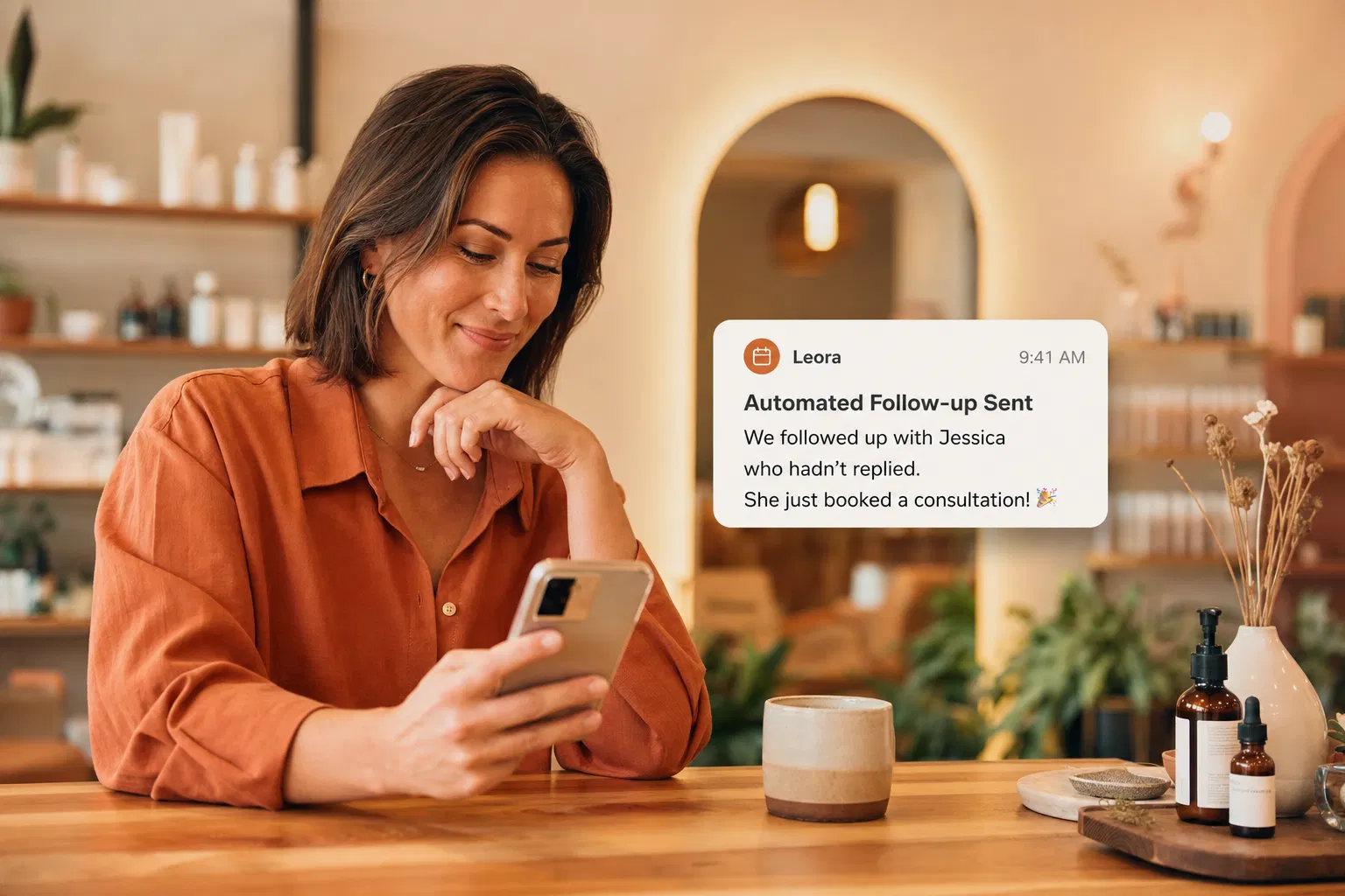 Service business owner reviewing automated follow-up notification