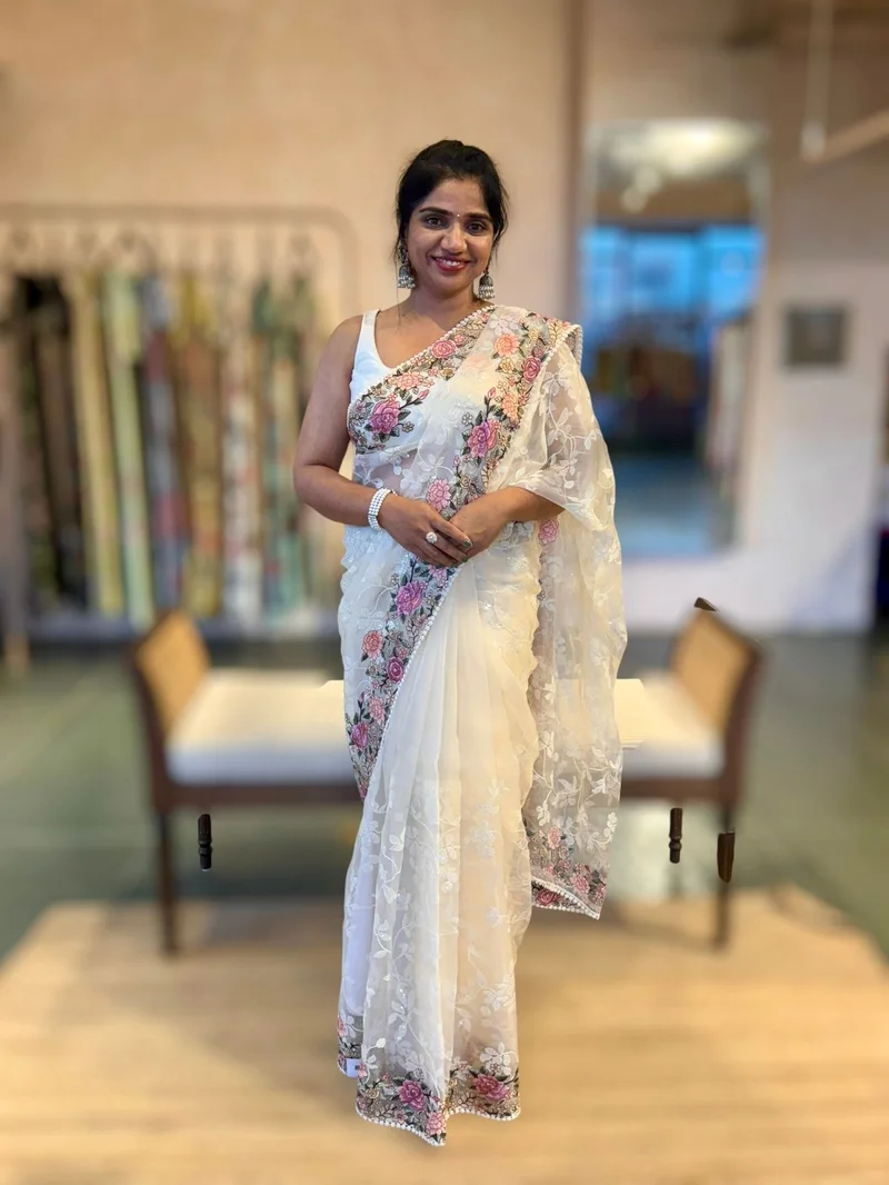 Organza sarees — sheer, lightweight fabric with delicate embroidery