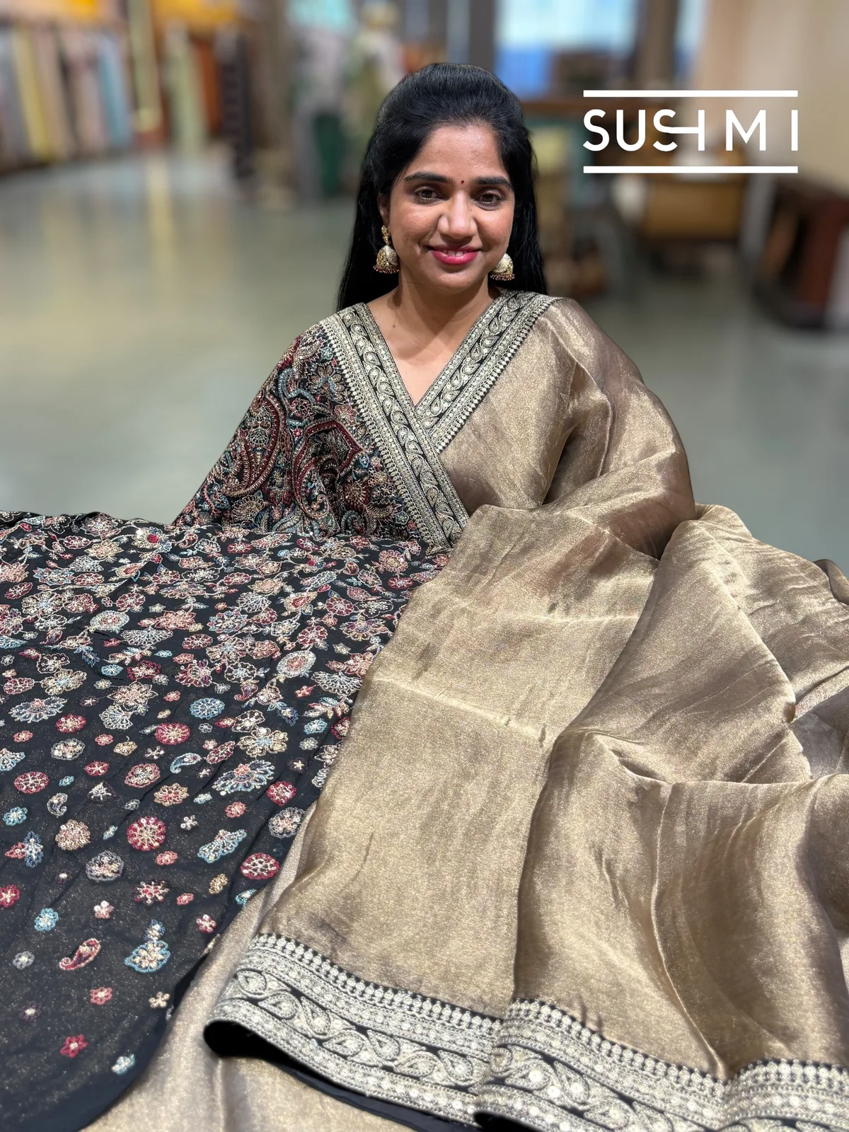 Antique Black Tissue Saree with heavy work blouse