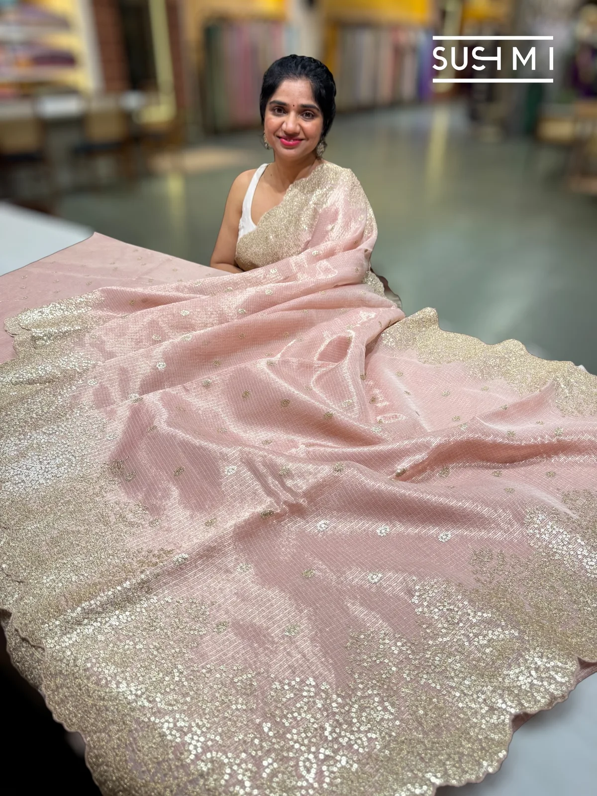 Pastel Pink Tissue Kota with heavy sequence embroidered cutwork border