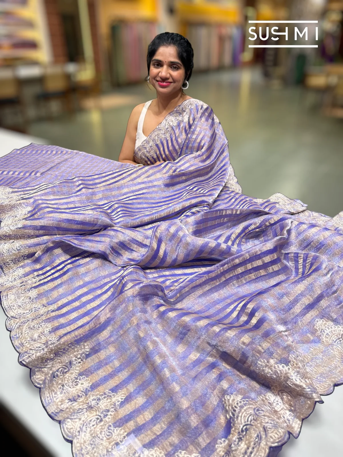 Tissue stripes saree with heavy embroidered border and fusion blouse 