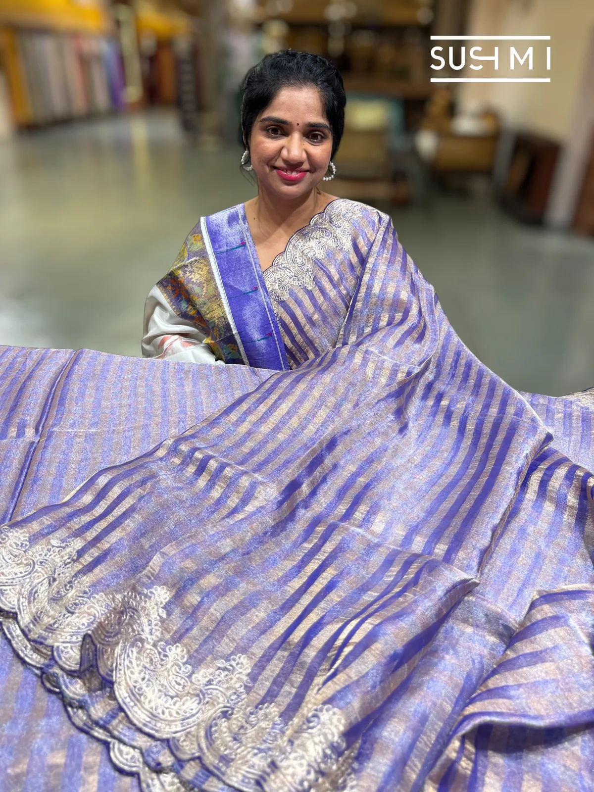 Tissue stripes saree with heavy embroidered border and fusion blouse — Image 4