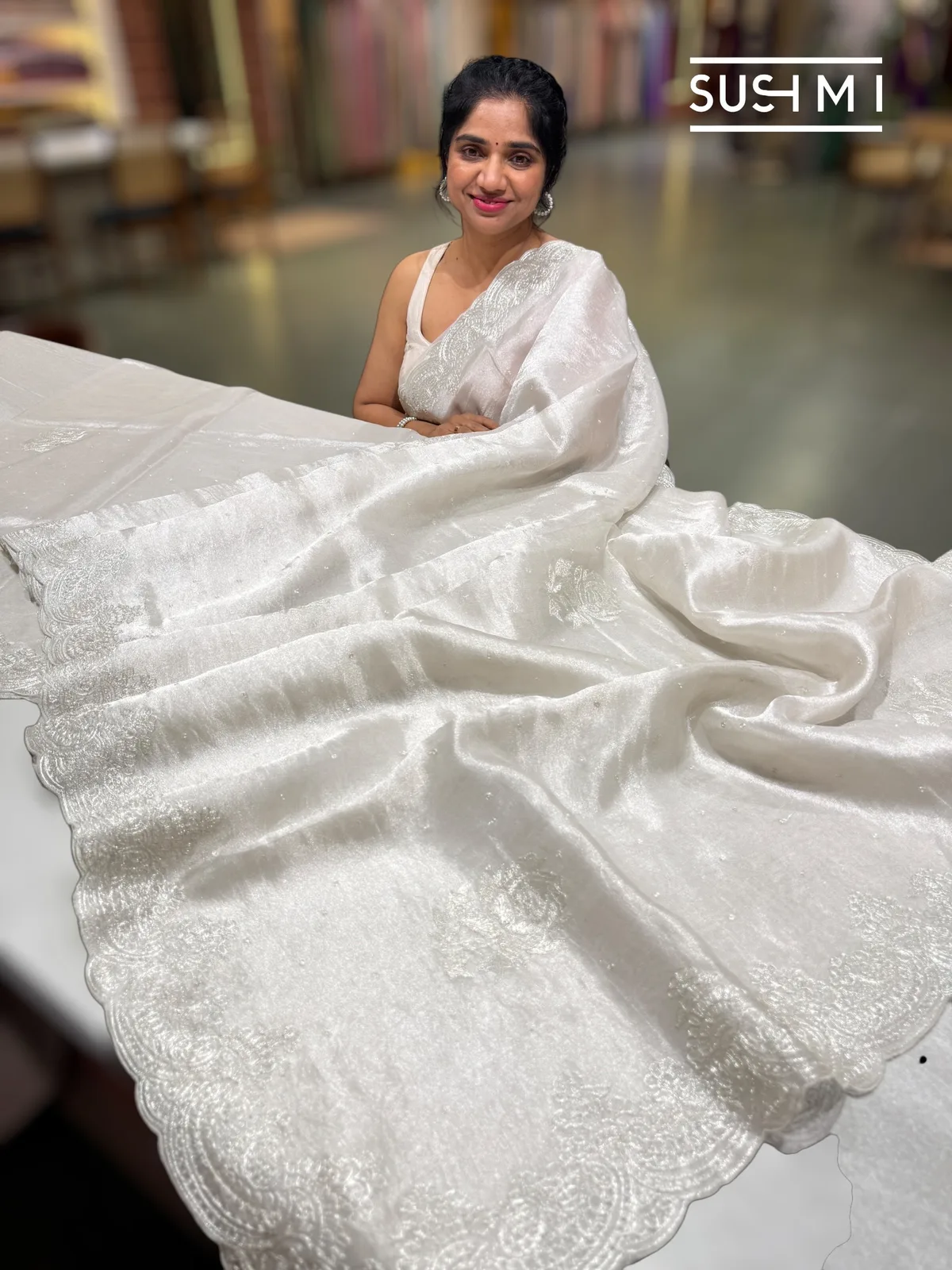 Silver tissue Saree with pita embroidered border and fusion blouse 