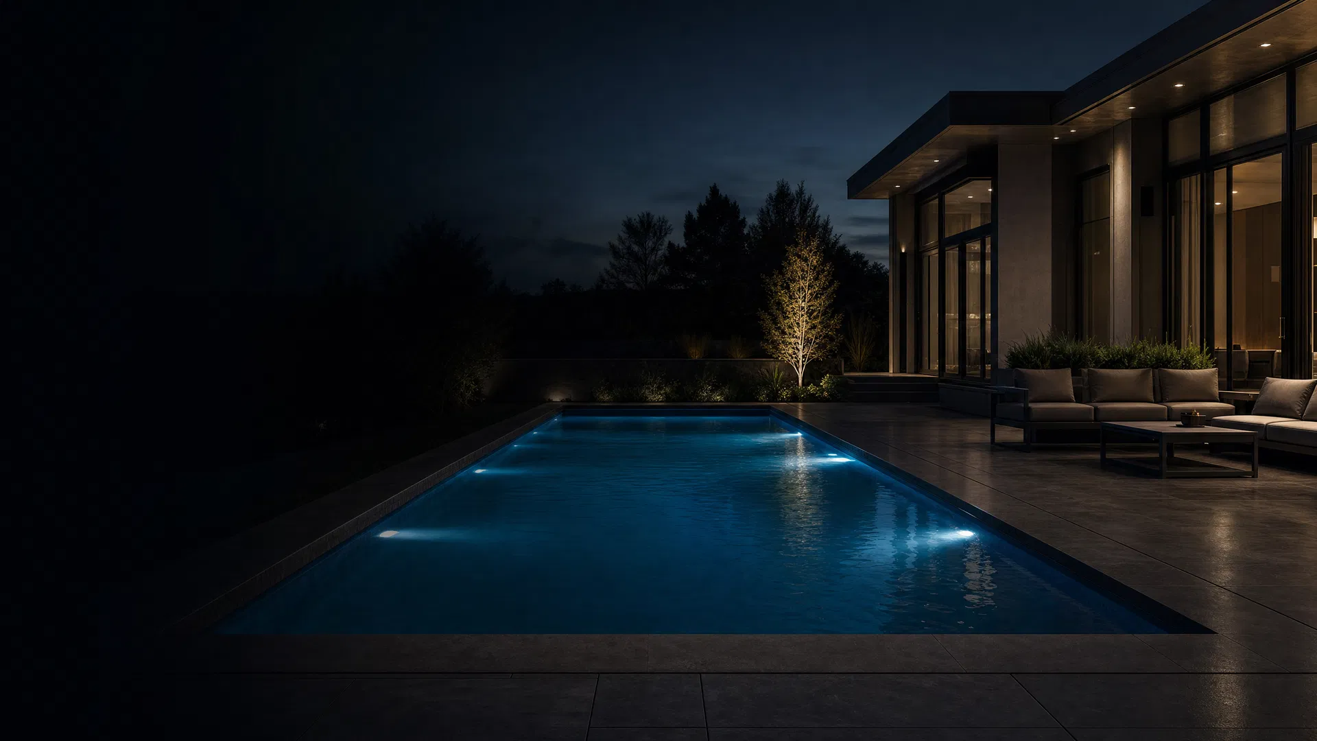 Luxury custom shotcrete pool at dusk