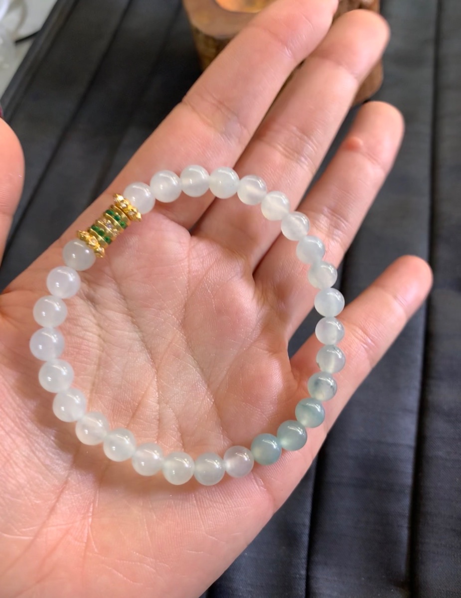   Icy White & Floating Blue Jade Bead Bracelet with Gold Spacer