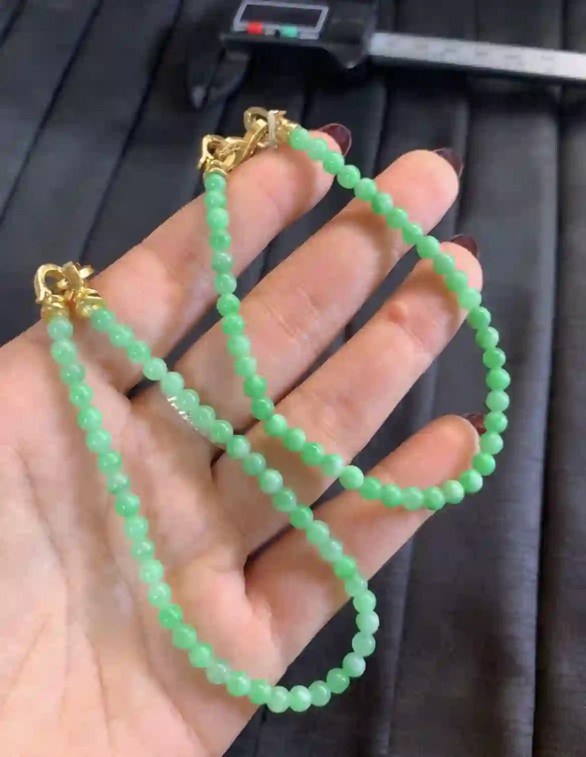  Natural Icy Green Jadeite Beaded Bracelet with Gold Plated Clasp, view 2 | Myanmar Jadeite reference #3210001