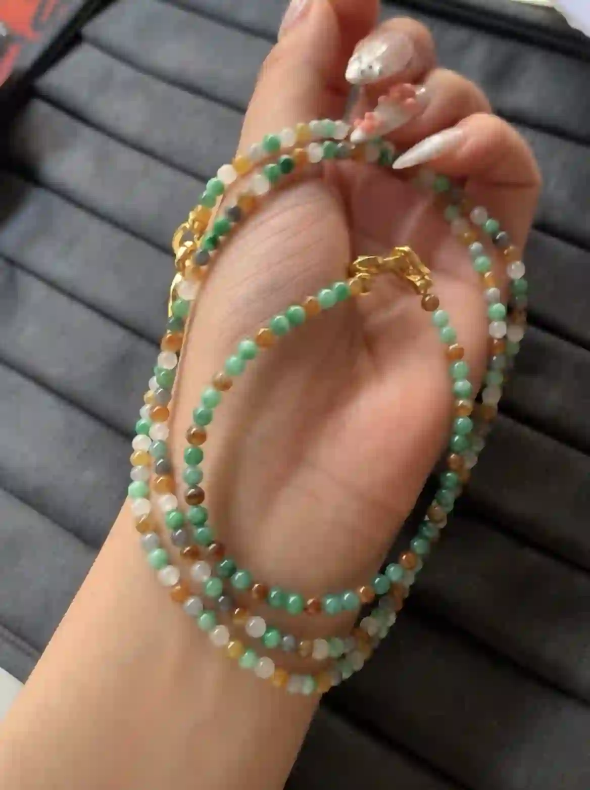 Multi-colored Beaded Necklace Held in Hand, view 2 | Myanmar Jadeite reference #1080001