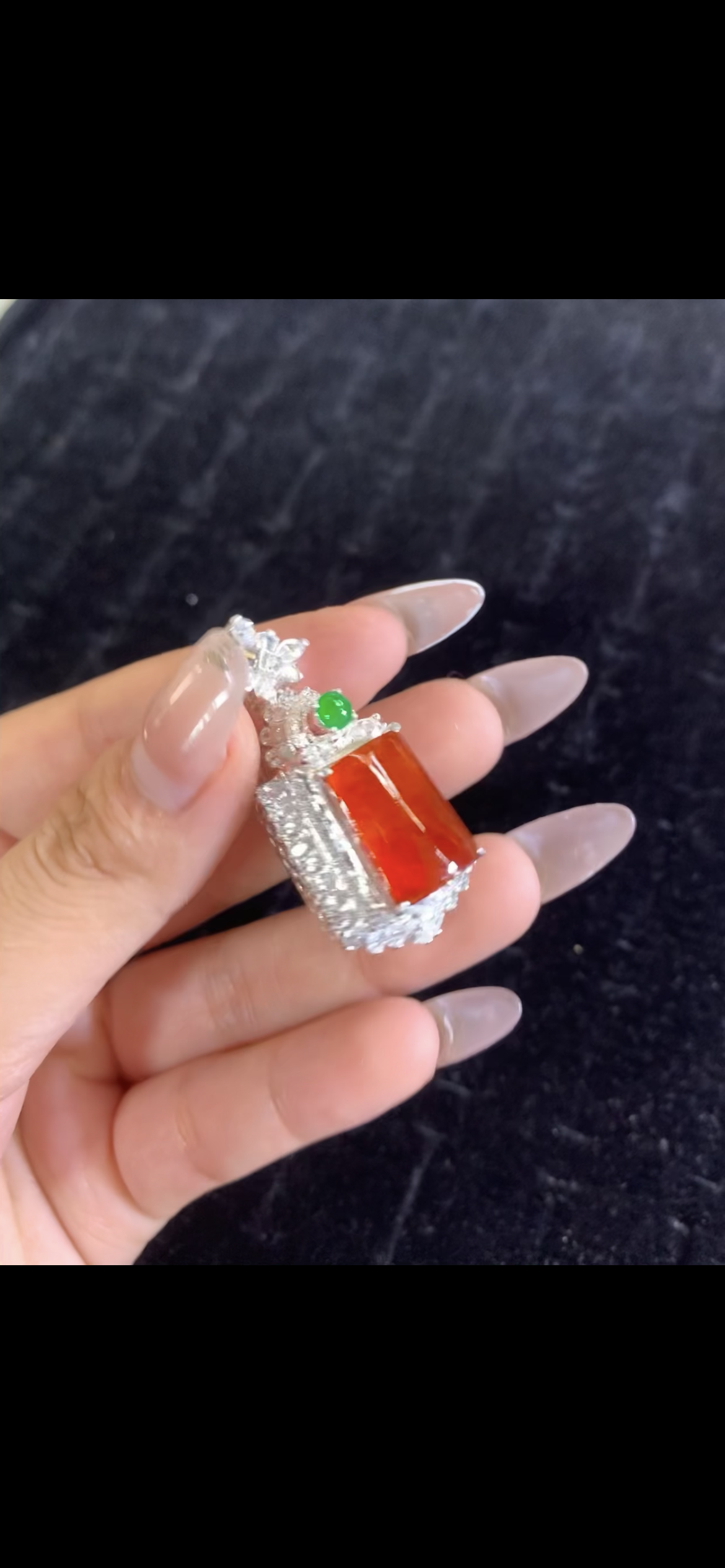 Vivid Red Jade Cabochon Pendant with Green Accent & Diamond Halo in Silver Setting