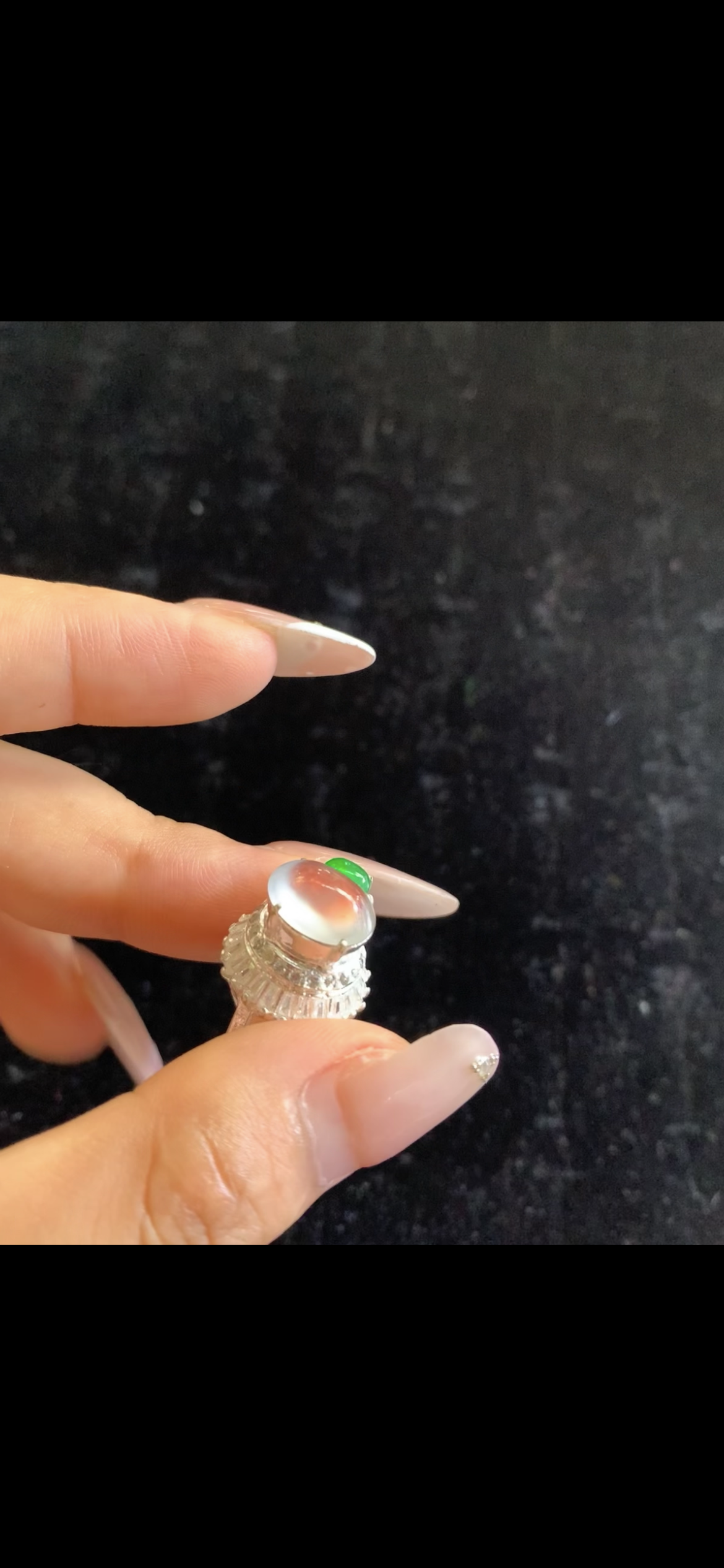 Icy White Jade Cabochon Ring with Vivid Green Accent & Diamond Halo