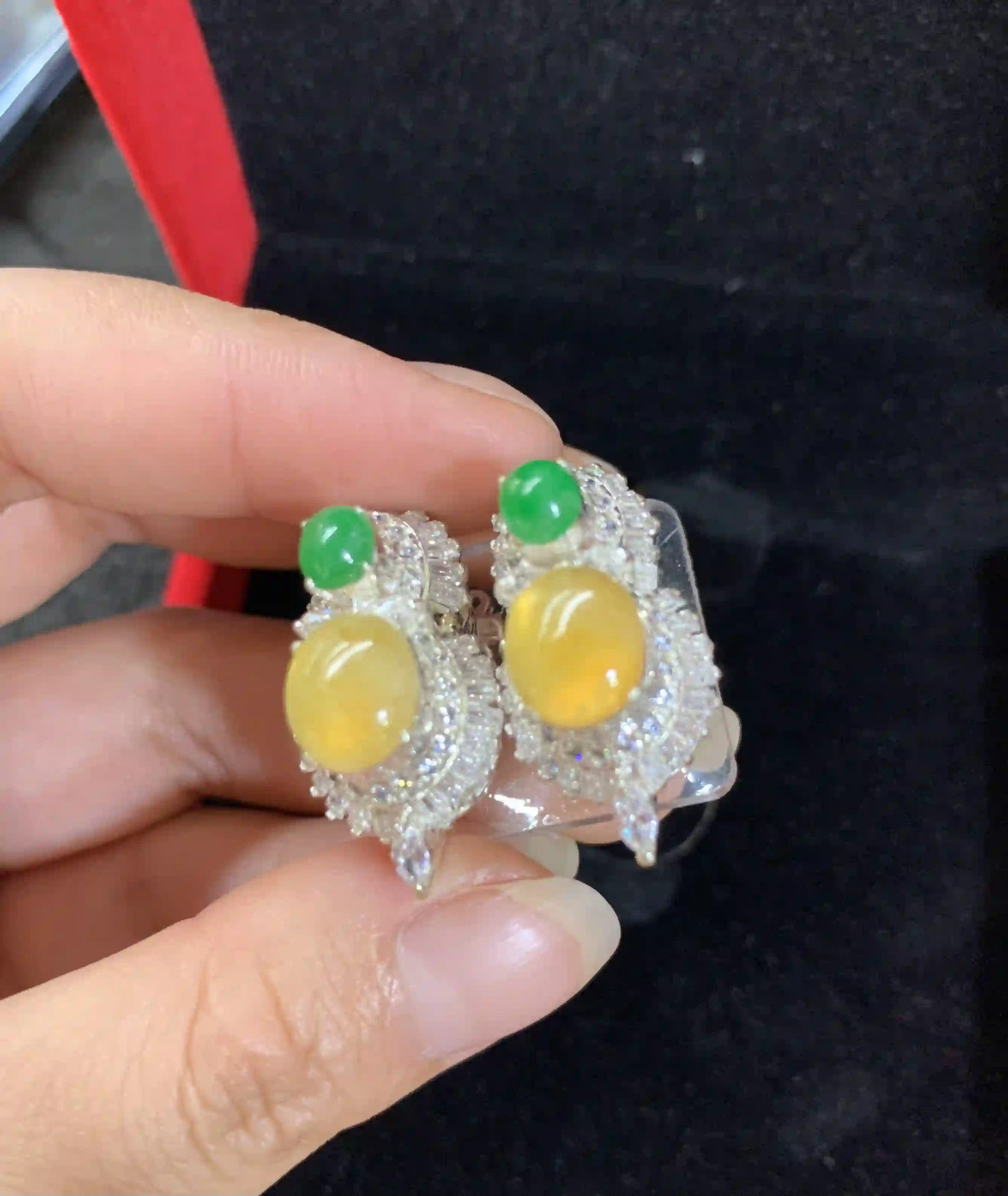 Pair of Yellow and Green Jadeite Earrings with Diamond-like Halo, view 2 | Myanmar Jadeite reference #240003