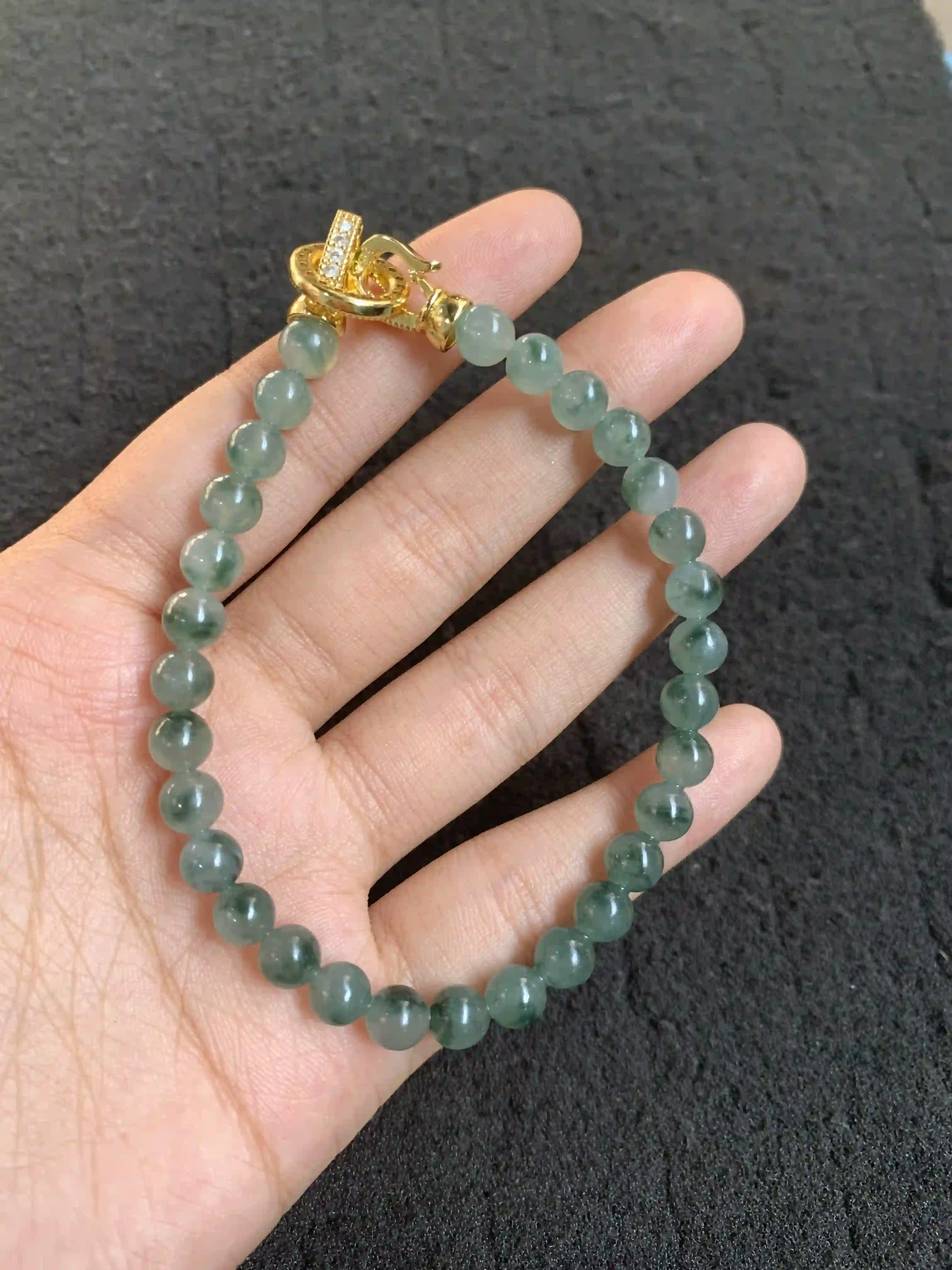Dark Green Translucent Jade Beaded Bracelet with Diamond-Accented Gold Clasp | Myanmar Jadeite reference #510004