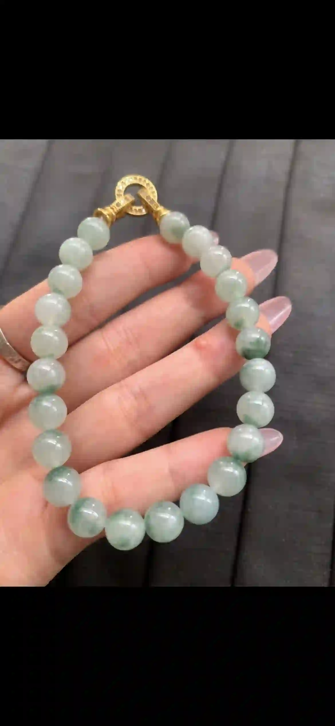 Icy Floating Green Jadeite Bead Bracelet with Gold Clasp, view 2 | Myanmar Jadeite reference #10290001