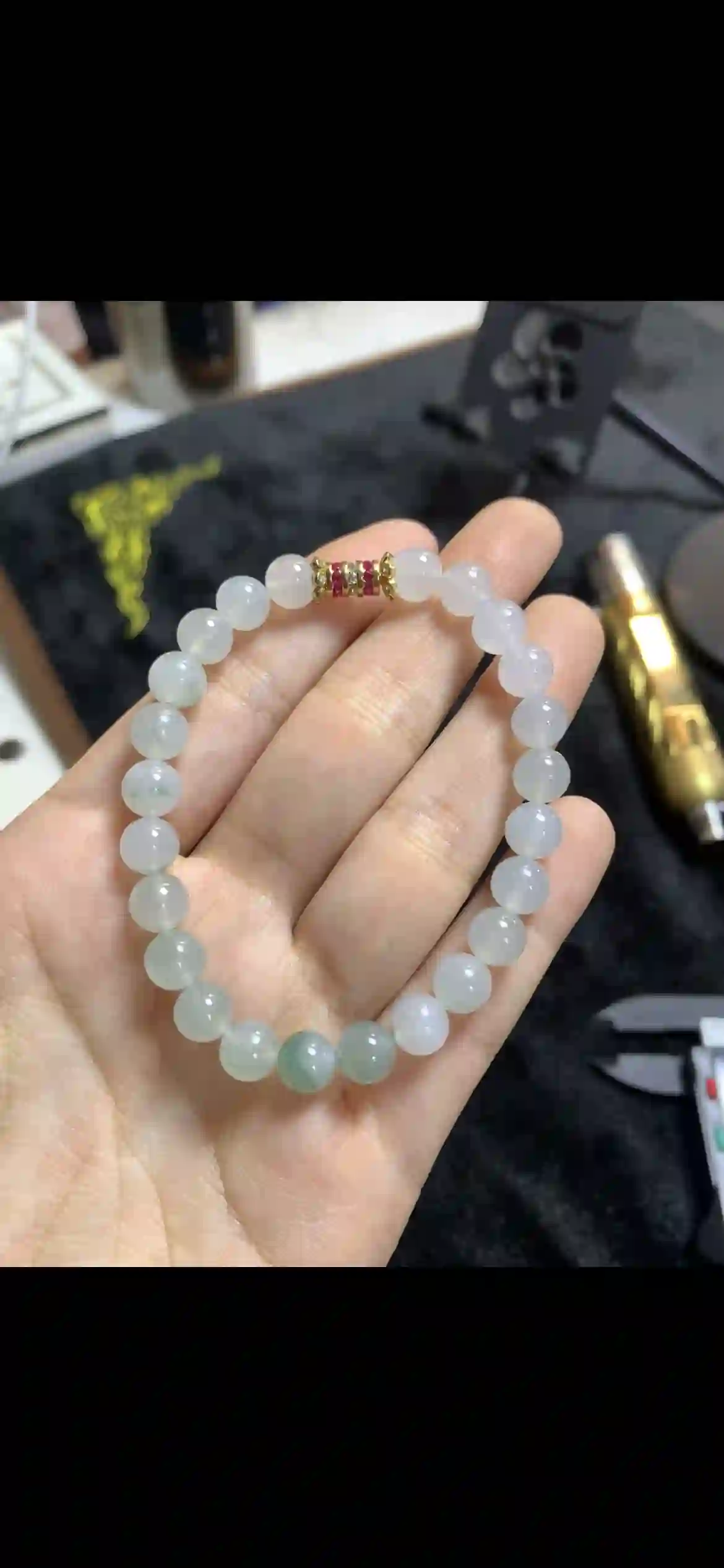 Icy Pale Jadeite Bead Bracelet with Floating Green Accents, view 2 | Myanmar Jadeite reference #16470001