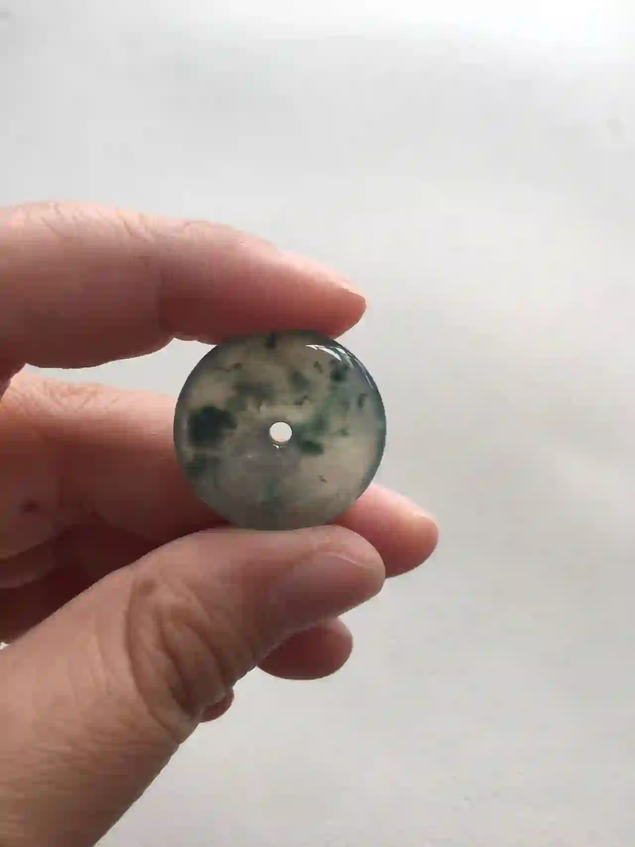 Icy Jade Donut Pendant with Green Floral Inclusions, view 2 | Myanmar Jadeite reference #2070009