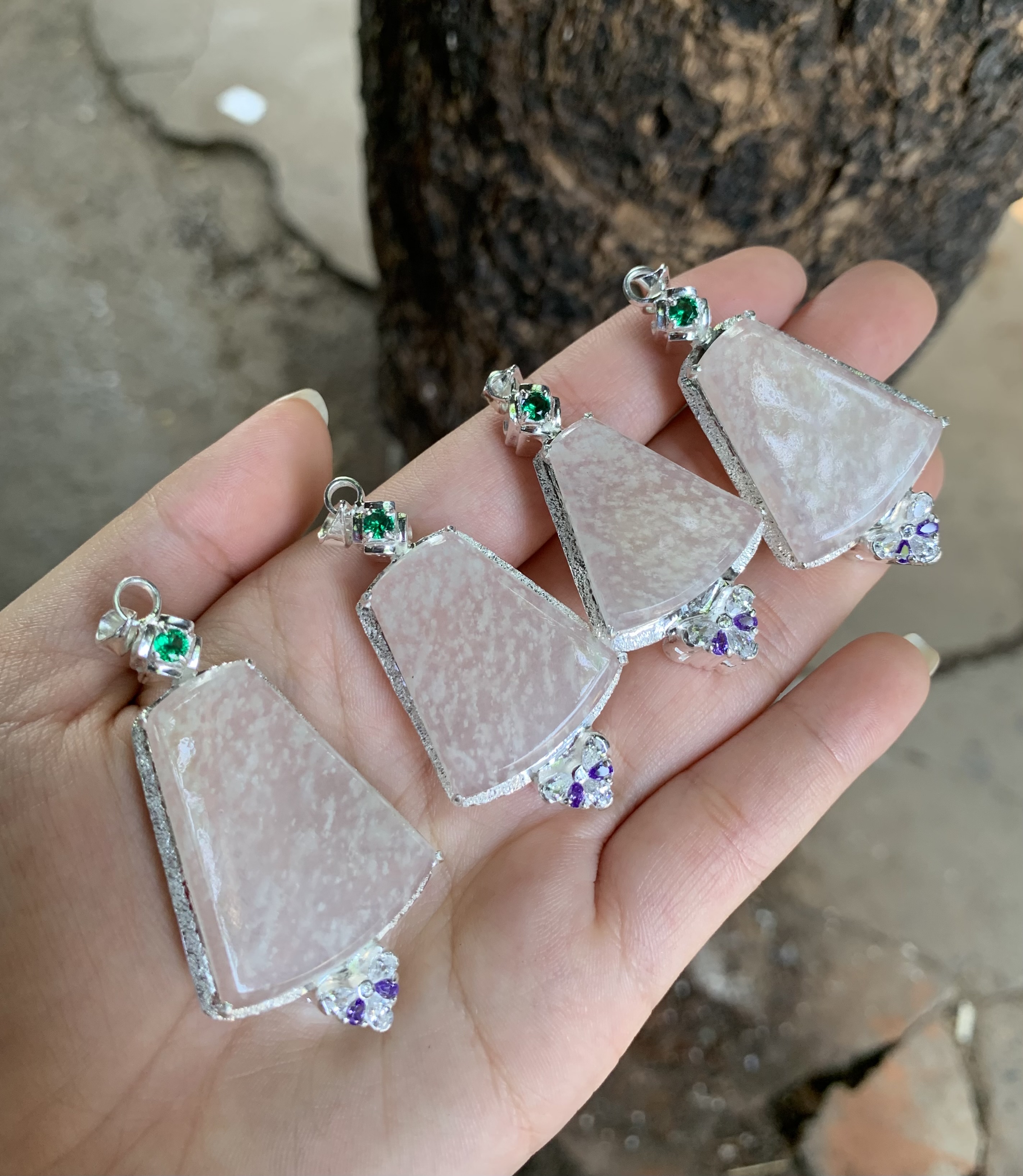  Frosted White Jadeite Pendants with Silver Settings and Accent Stones