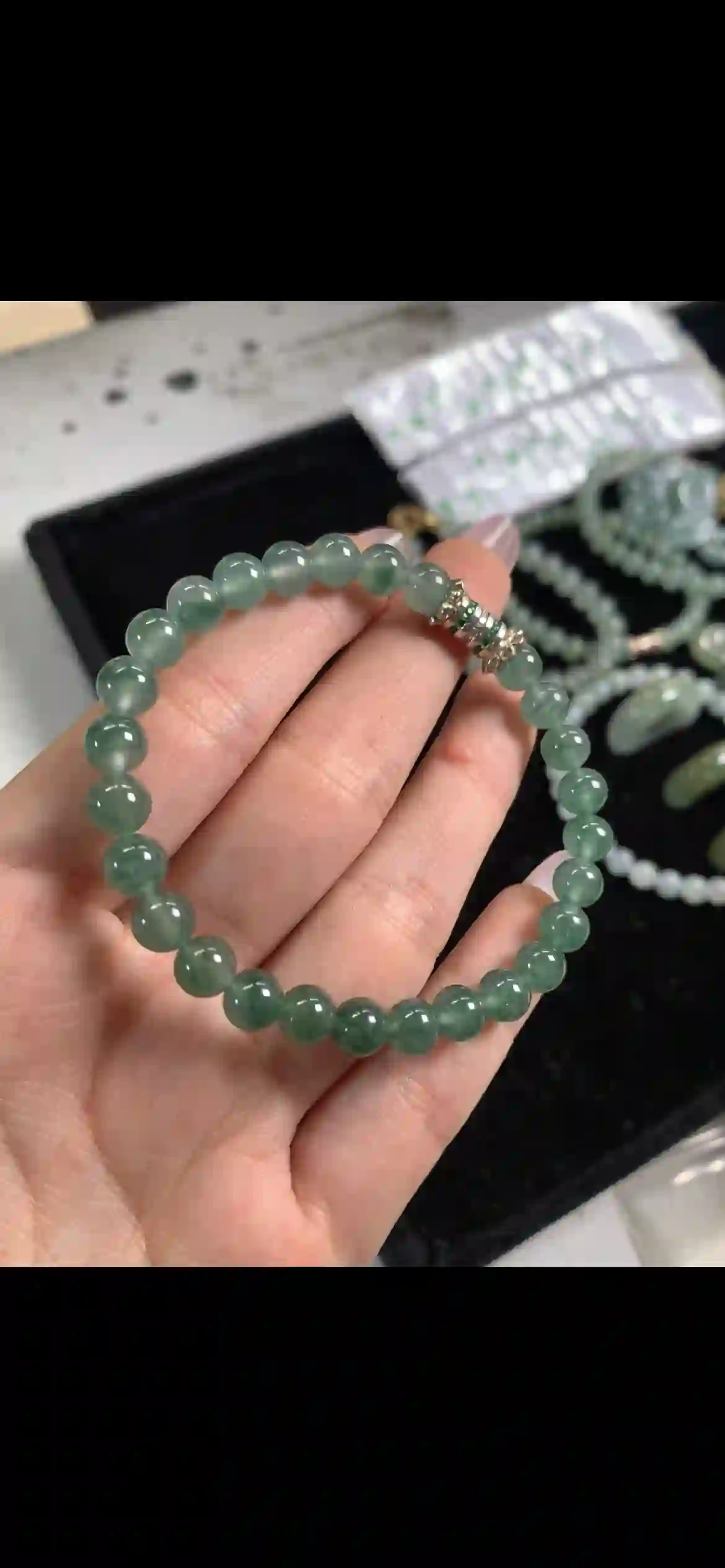 Icy Dark Green Floating Pattern Jadeite Bead Bracelet, view 2 | Myanmar Jadeite reference #11220002