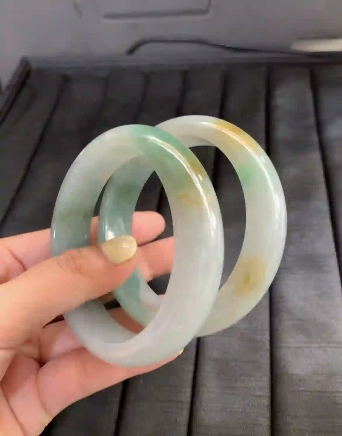 Natural Icy Green Jade Bangle Pair with Yellow Accents, view 2 | Myanmar Jadeite reference #2610007