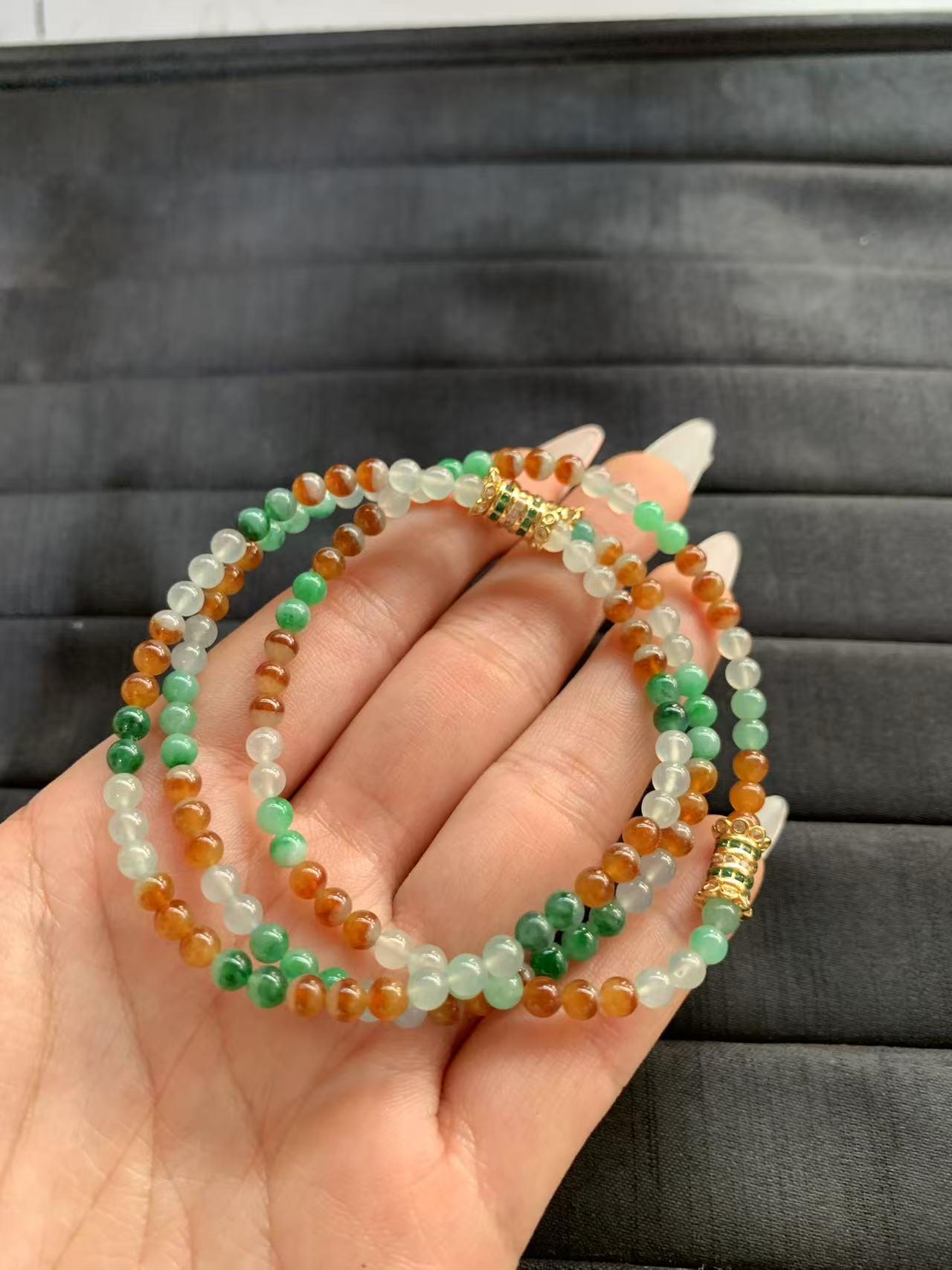 Multi-Strand Colorful Jade Bead Bracelets with Gold Clasps Multi-Strand Colorful Jade Bead Bracelets with Gold Clasps - Burmese Jadeite from Myanmar
