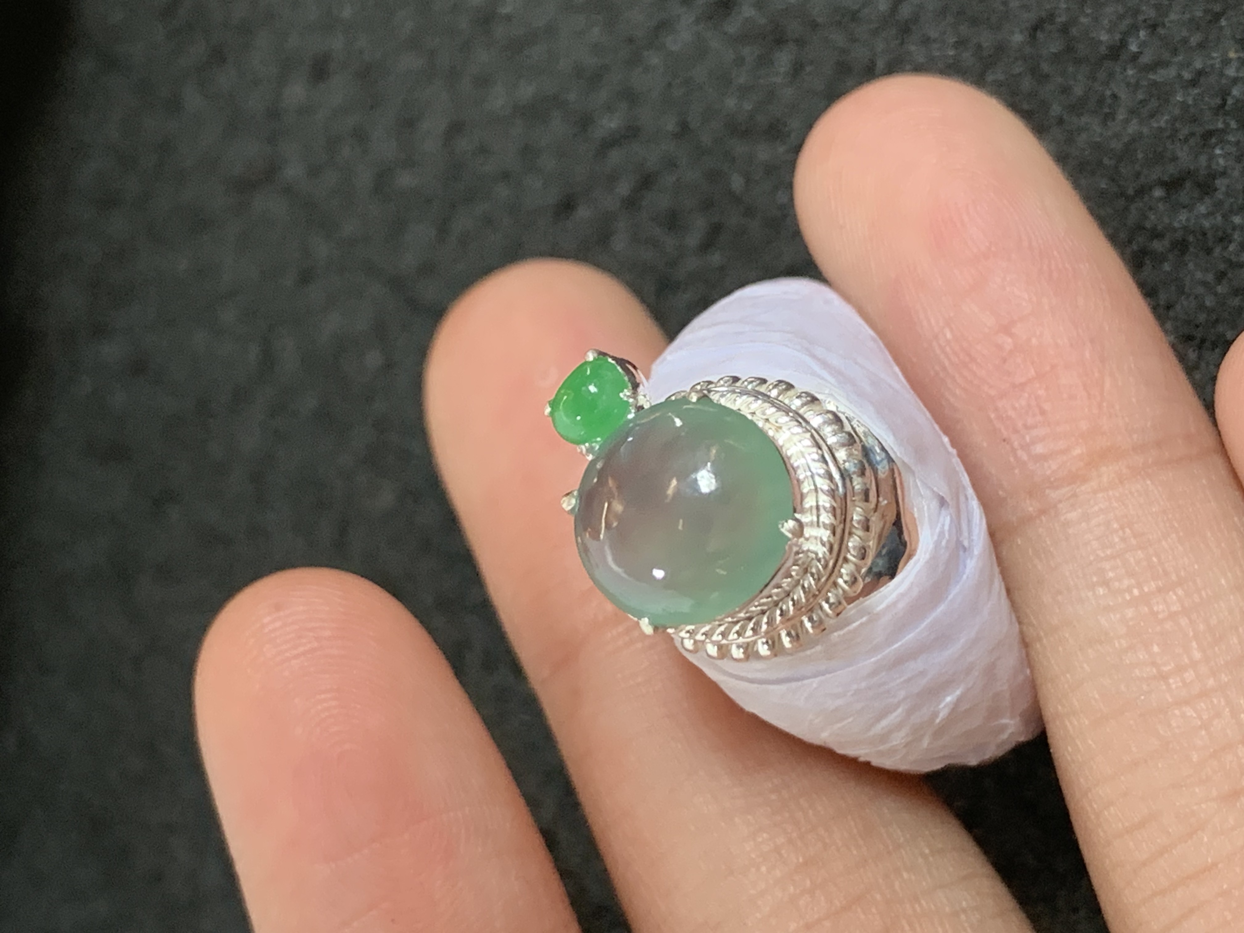 Unique Translucent Green Gemstone Ring with Accent Stone