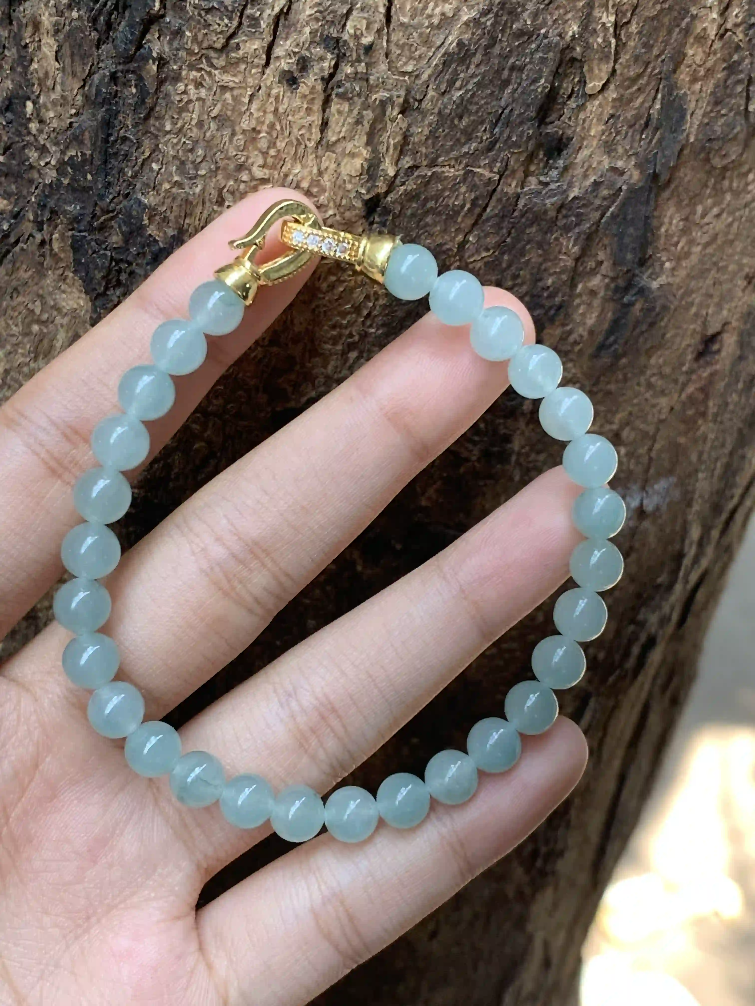 Natural Icy Green Jade Beaded Bracelet with Gold Clasp, view 2 | Myanmar Jadeite reference #2220002