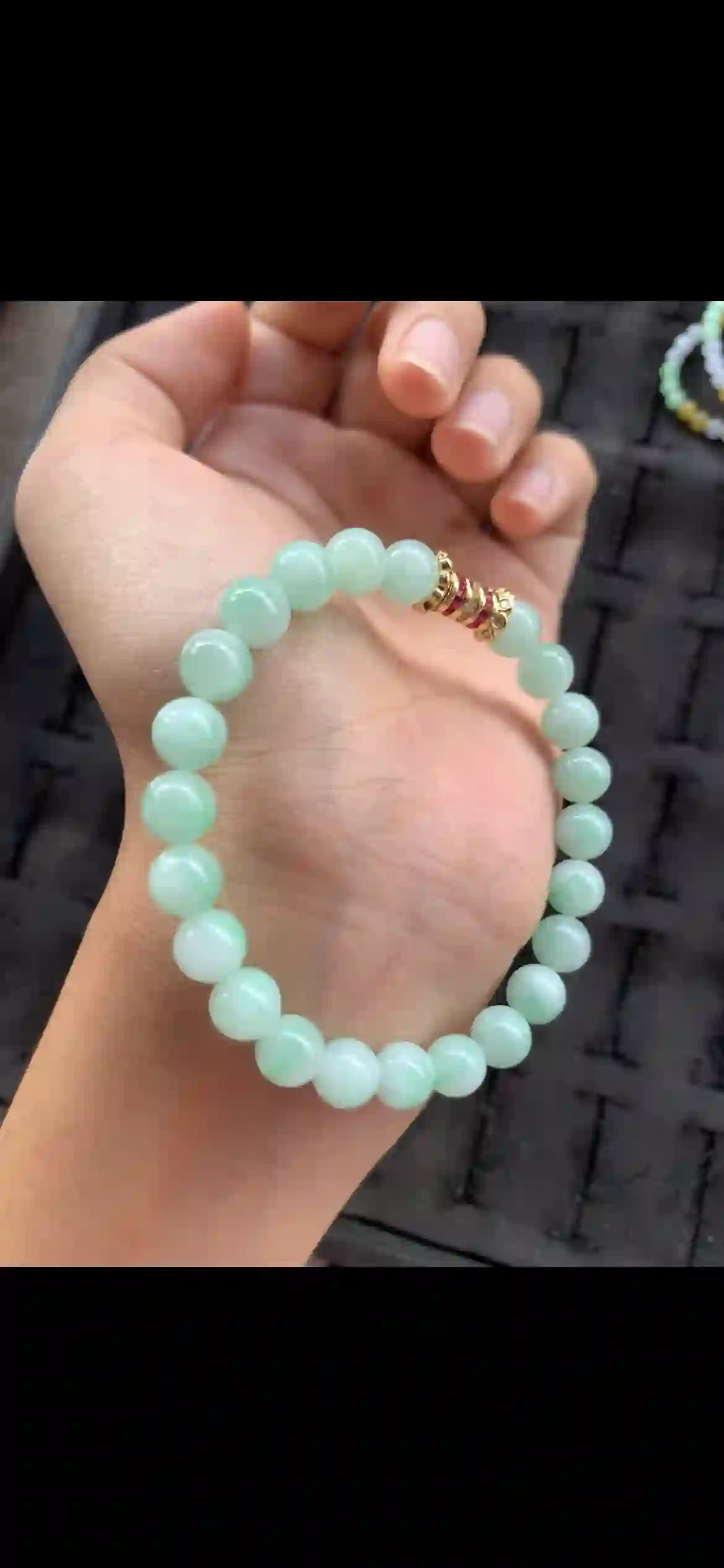 Soft Mint Green Jade Bead Bracelet with Gold & Ruby Accent Spacer, view 2 | Myanmar Jadeite reference #21660001