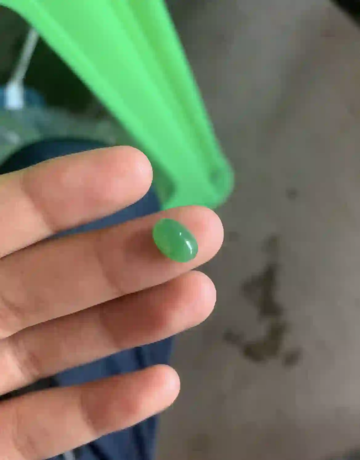 Polished Oval Vivid Green Jade Cabochon Gemstone, view 2 | Myanmar Jadeite reference #22320001