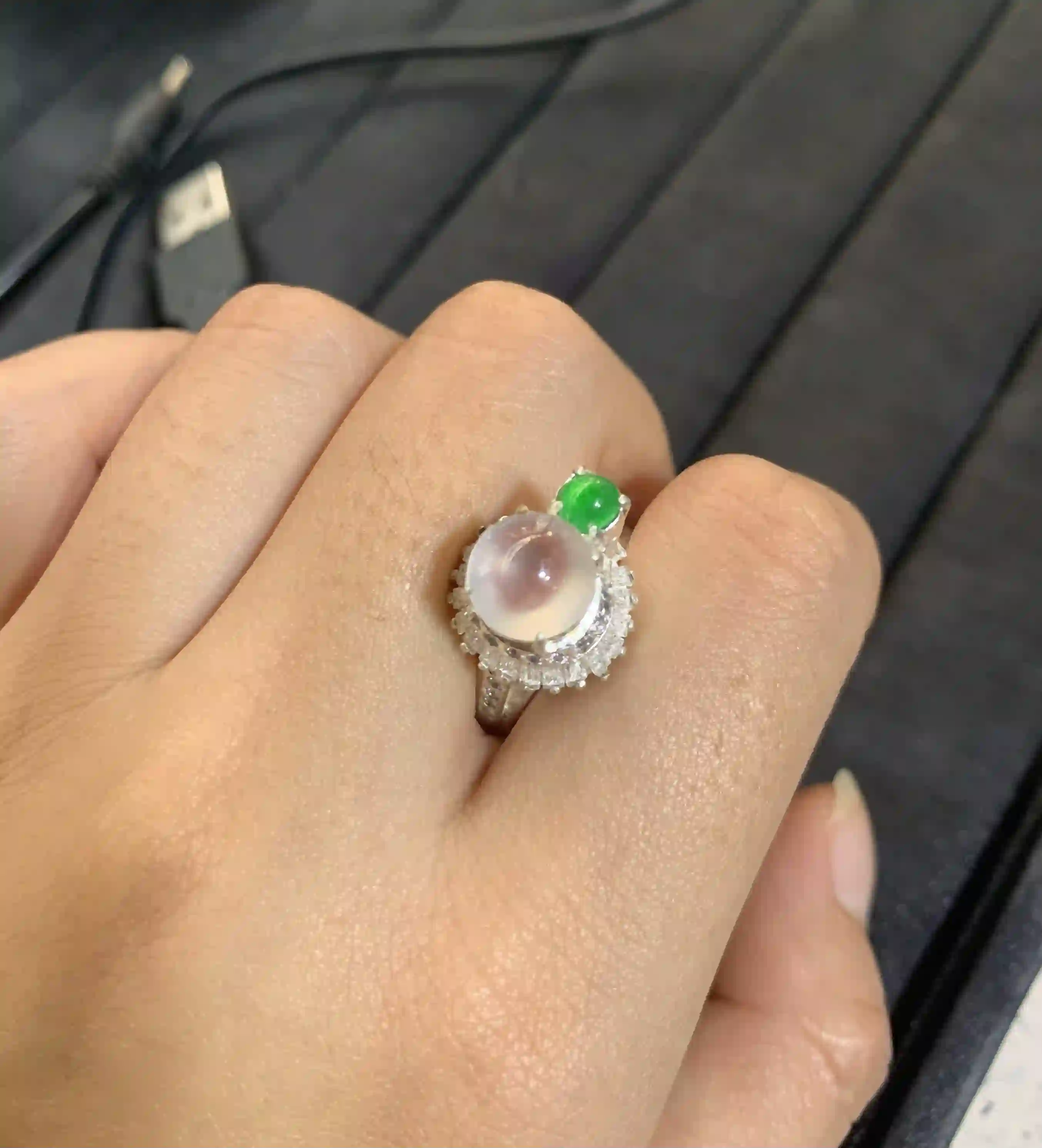 Icy Jadeite Cabochon Ring with Green Accents and Diamond Halo, view 2 | Myanmar Jadeite reference #210001