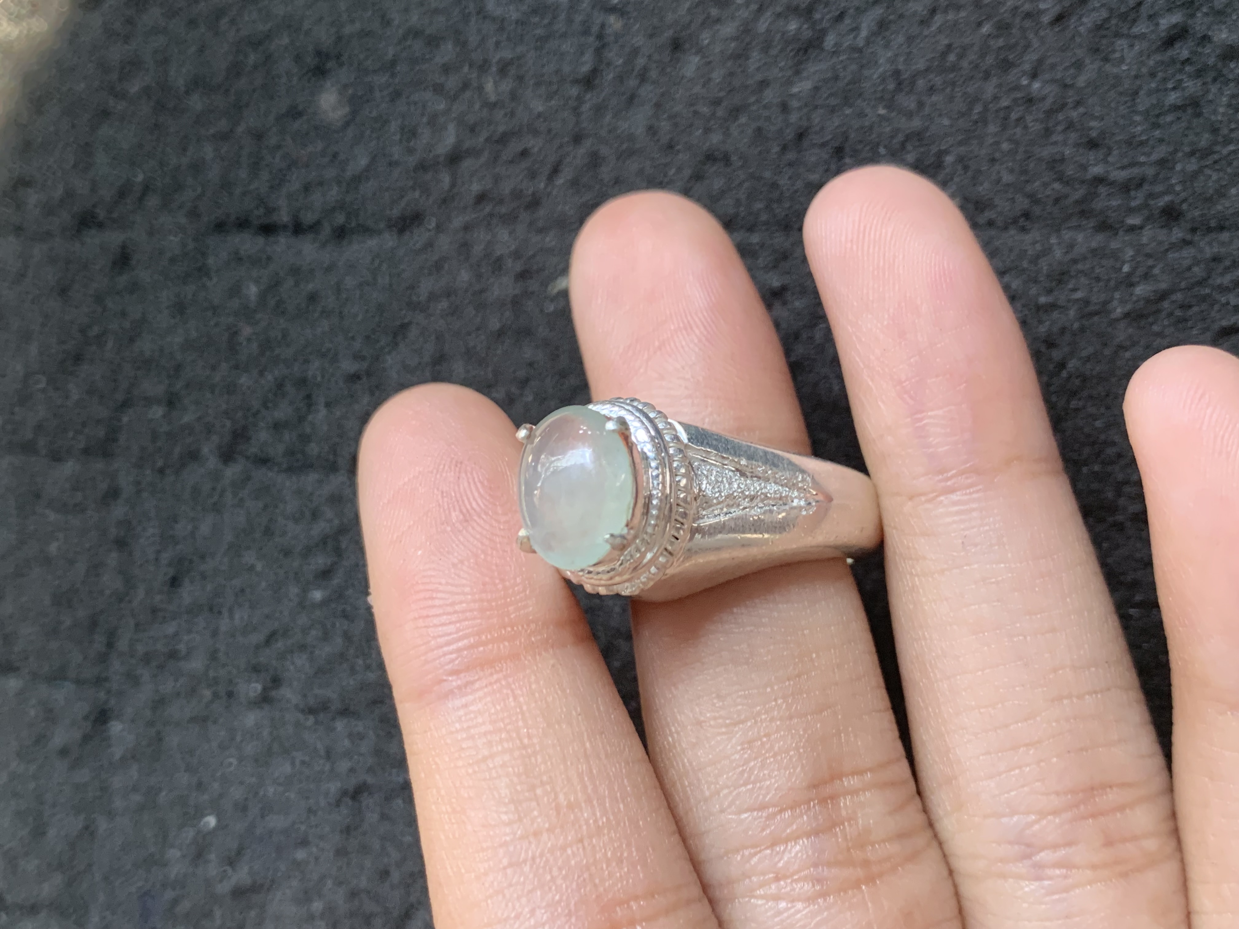 Elegant Translucent Gemstone Ring on Finger