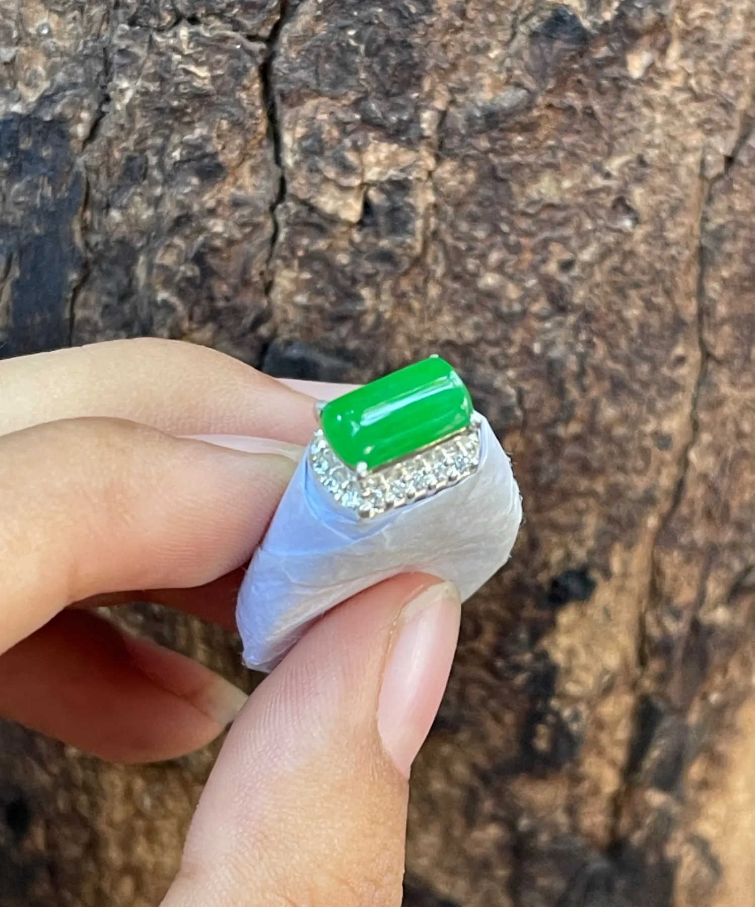 High-End Natural Glassy Variety Imperial Green Jadeite Saddle Ring Accentuated with Diamond Paved Halo | Myanmar Jadeite reference #39210003