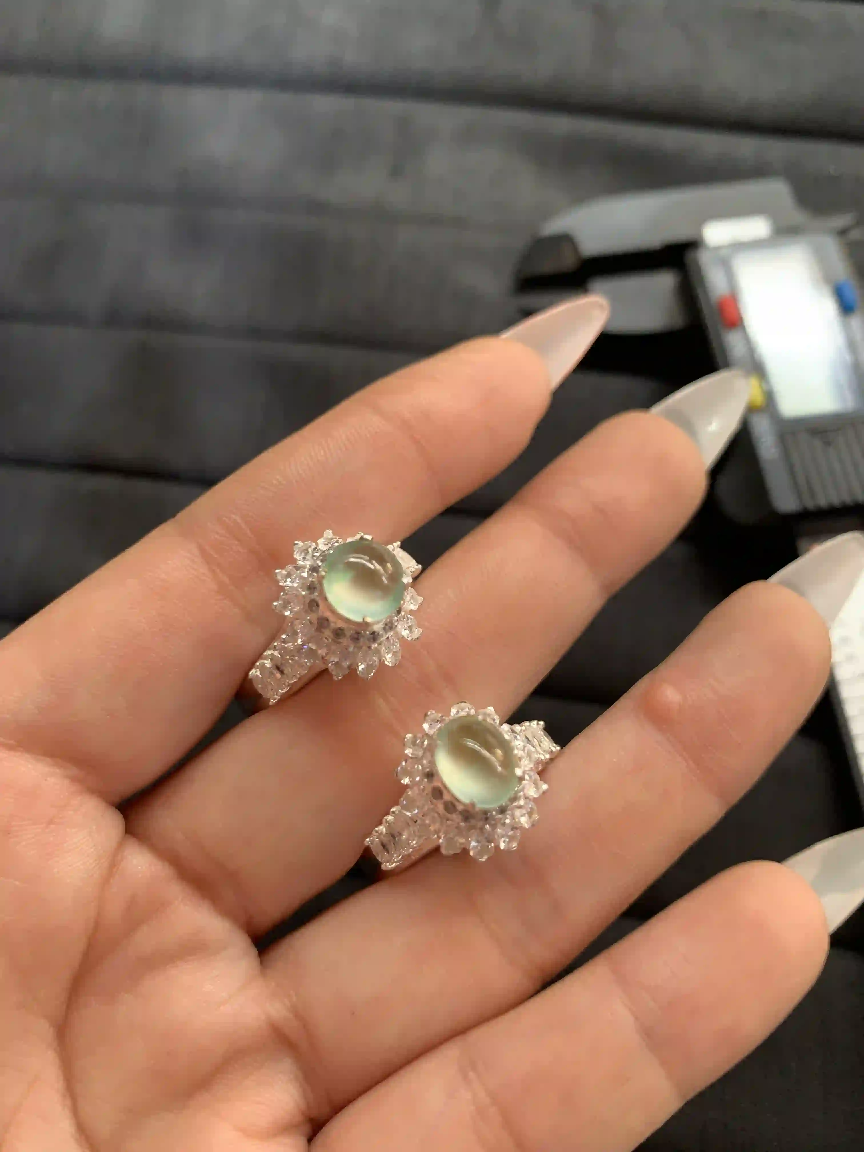  Pair of Silver-Toned Rings with Green Translucent Cabochons, view 2 | Myanmar Jadeite reference #1260002