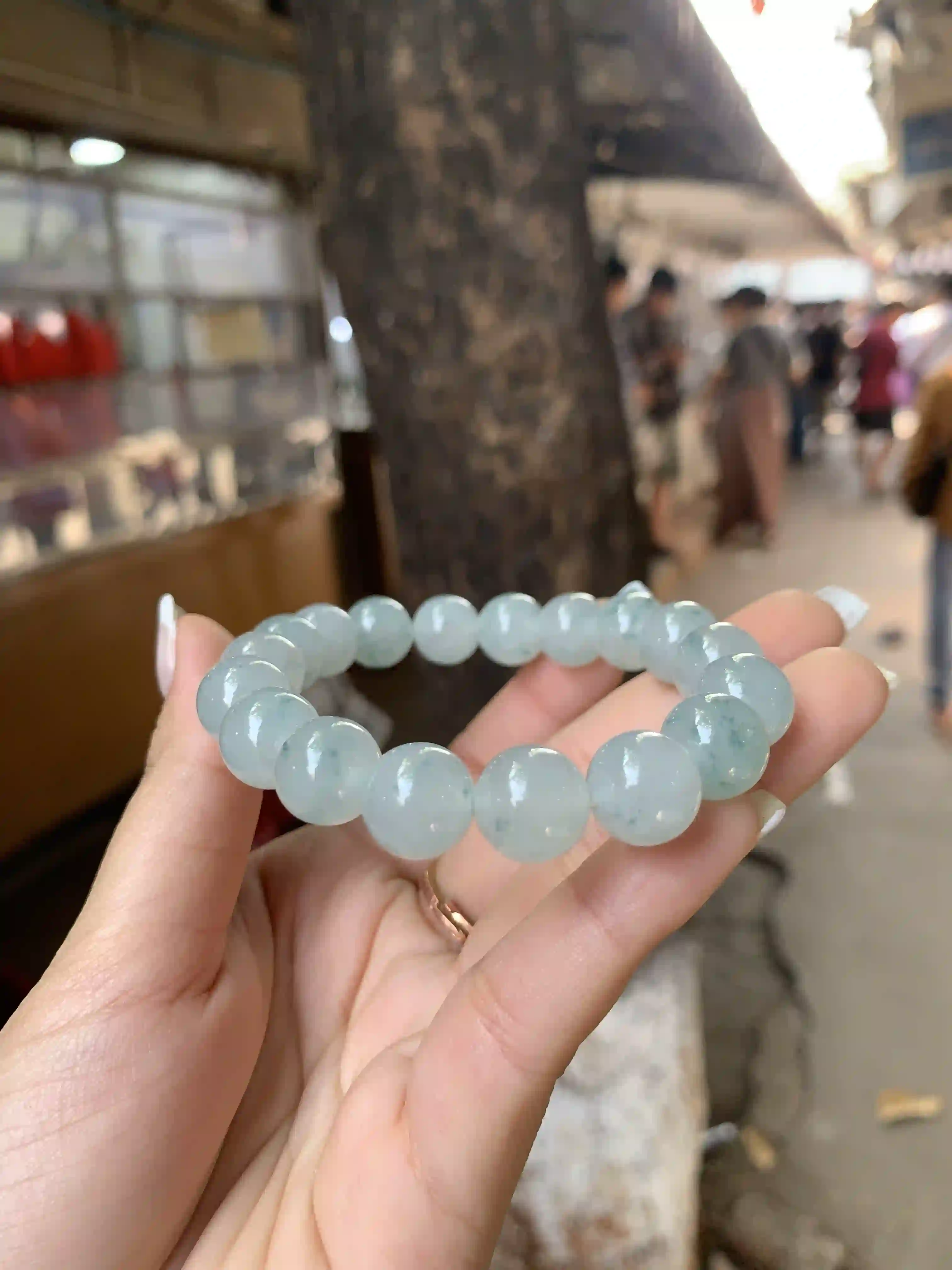 Translucent Light Green Jade Beaded Bracelet with Natural Cloud Patterns, view 2 | Myanmar Jadeite reference #510005