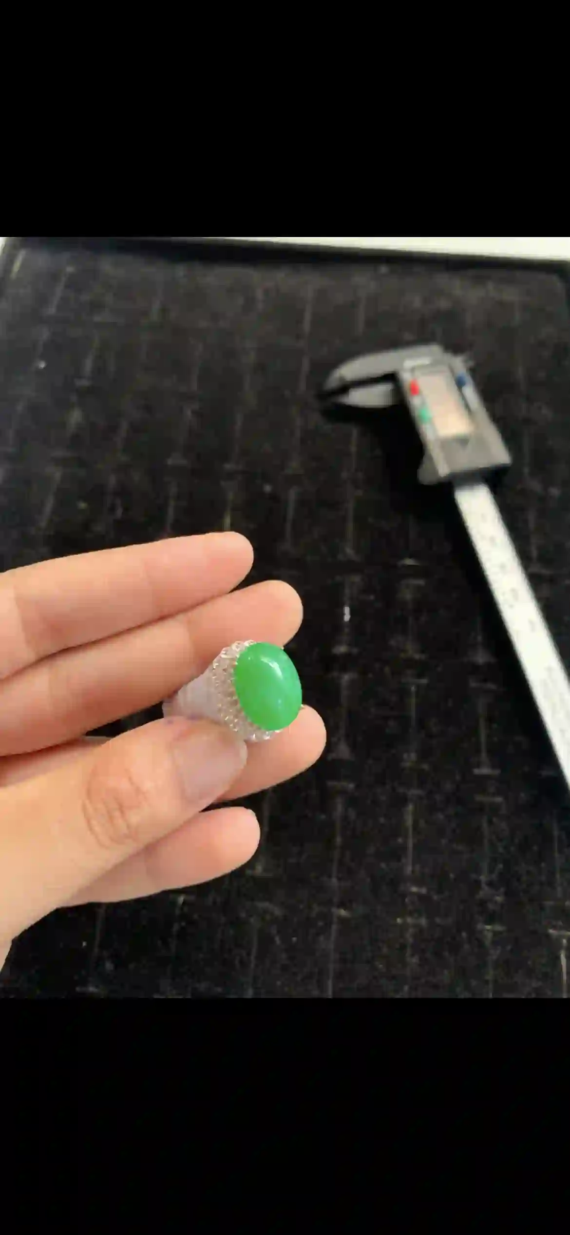 Vibrant Emerald Green Jadeite Cabochon Ring with Diamond Halo Setting, view 2 | Myanmar Jadeite reference #20190001