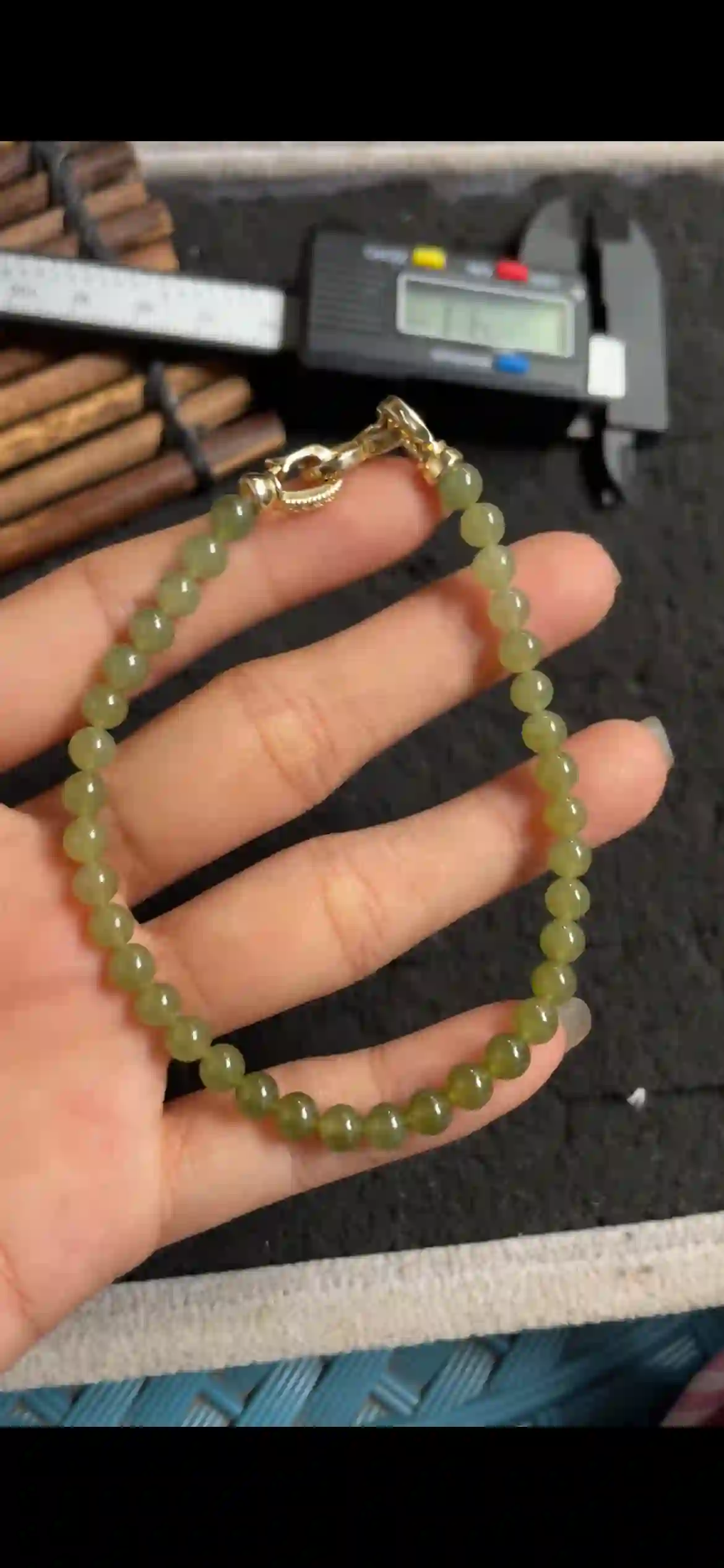 Olive Green Translucent Jade Bead Bracelet with Polished Gold Clasp | Myanmar Jadeite reference #5580001