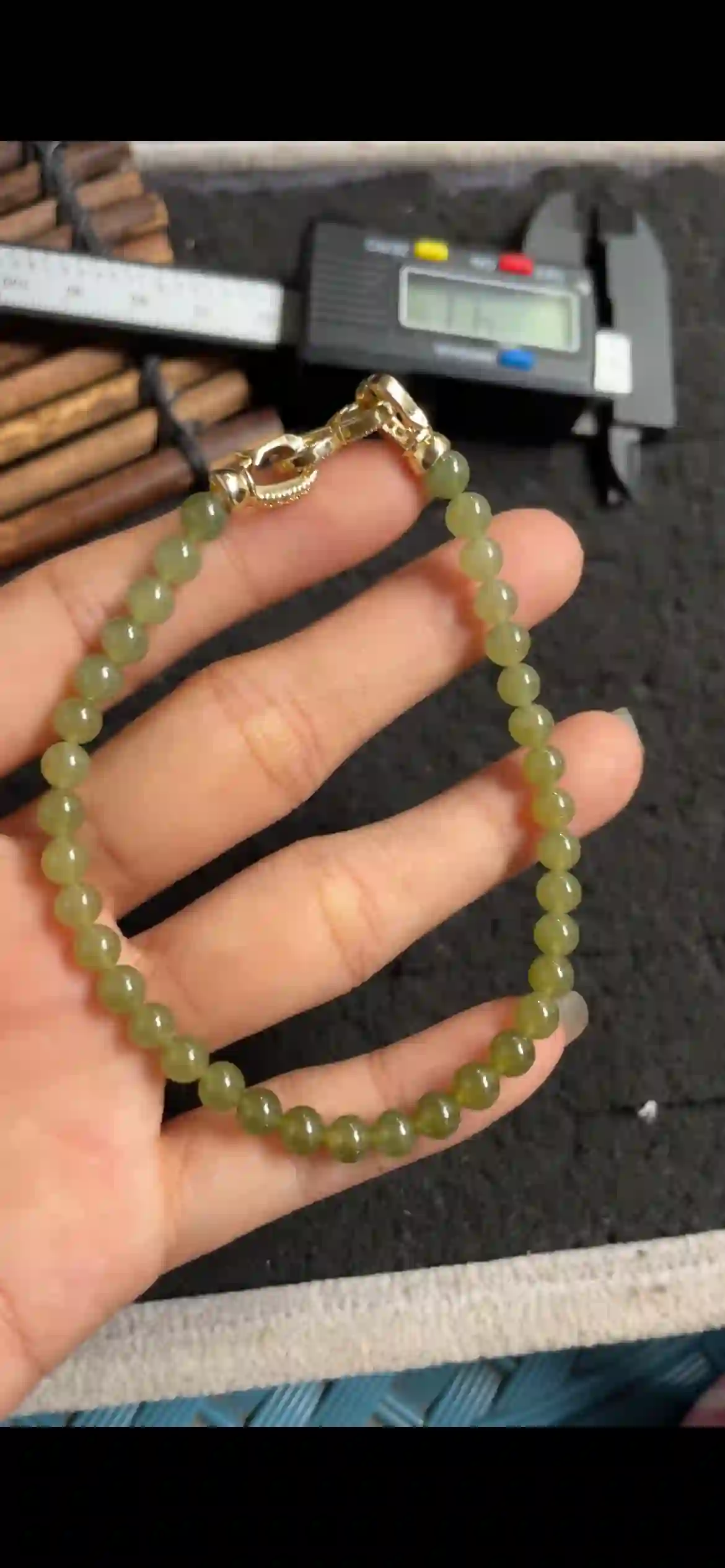 Olive Green Translucent Jade Bead Bracelet with Polished Gold Clasp, view 2 | Myanmar Jadeite reference #5580001