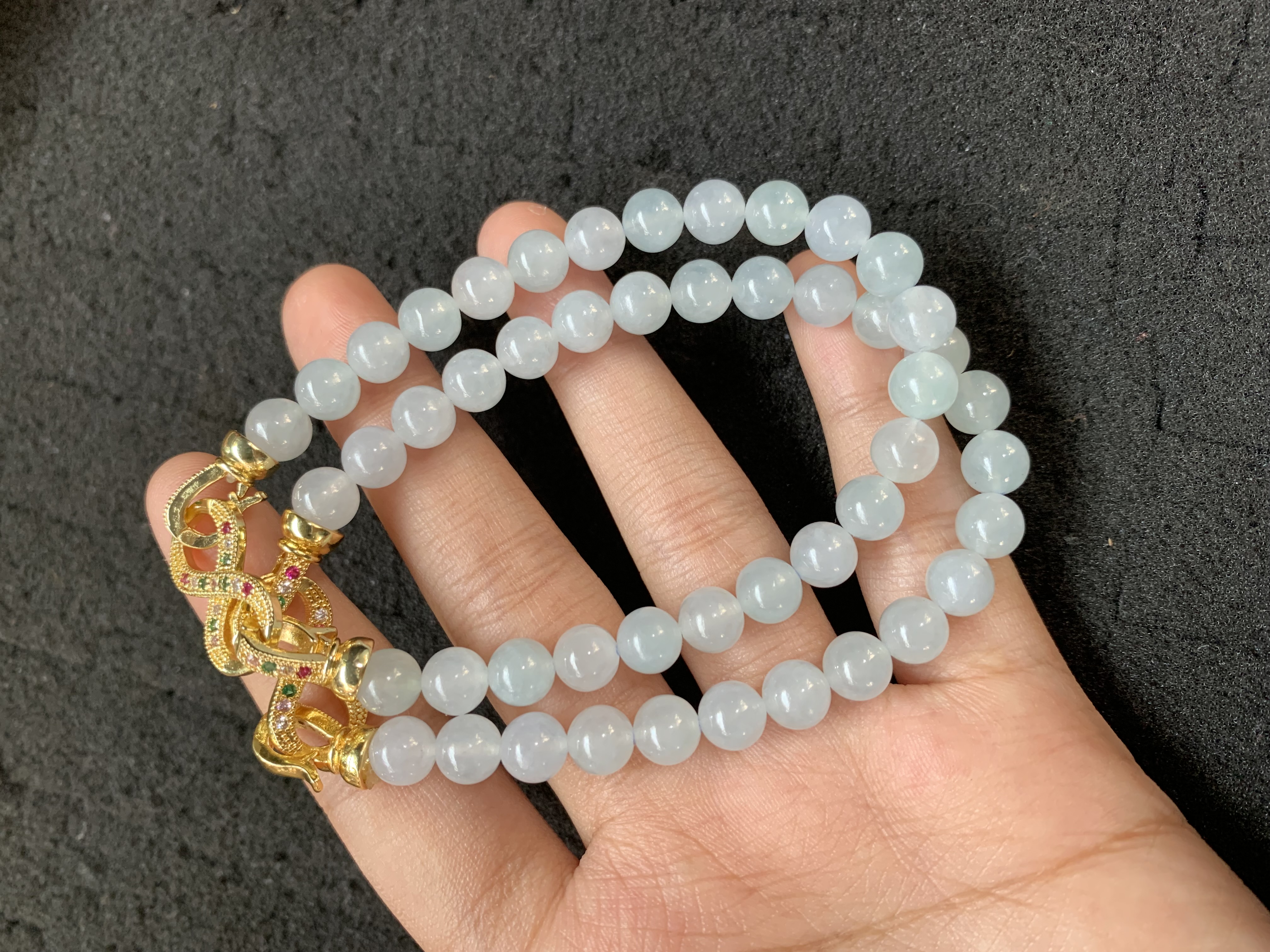 Translucent Light Green Jade Bead Necklace with Intricate Gold Clasp