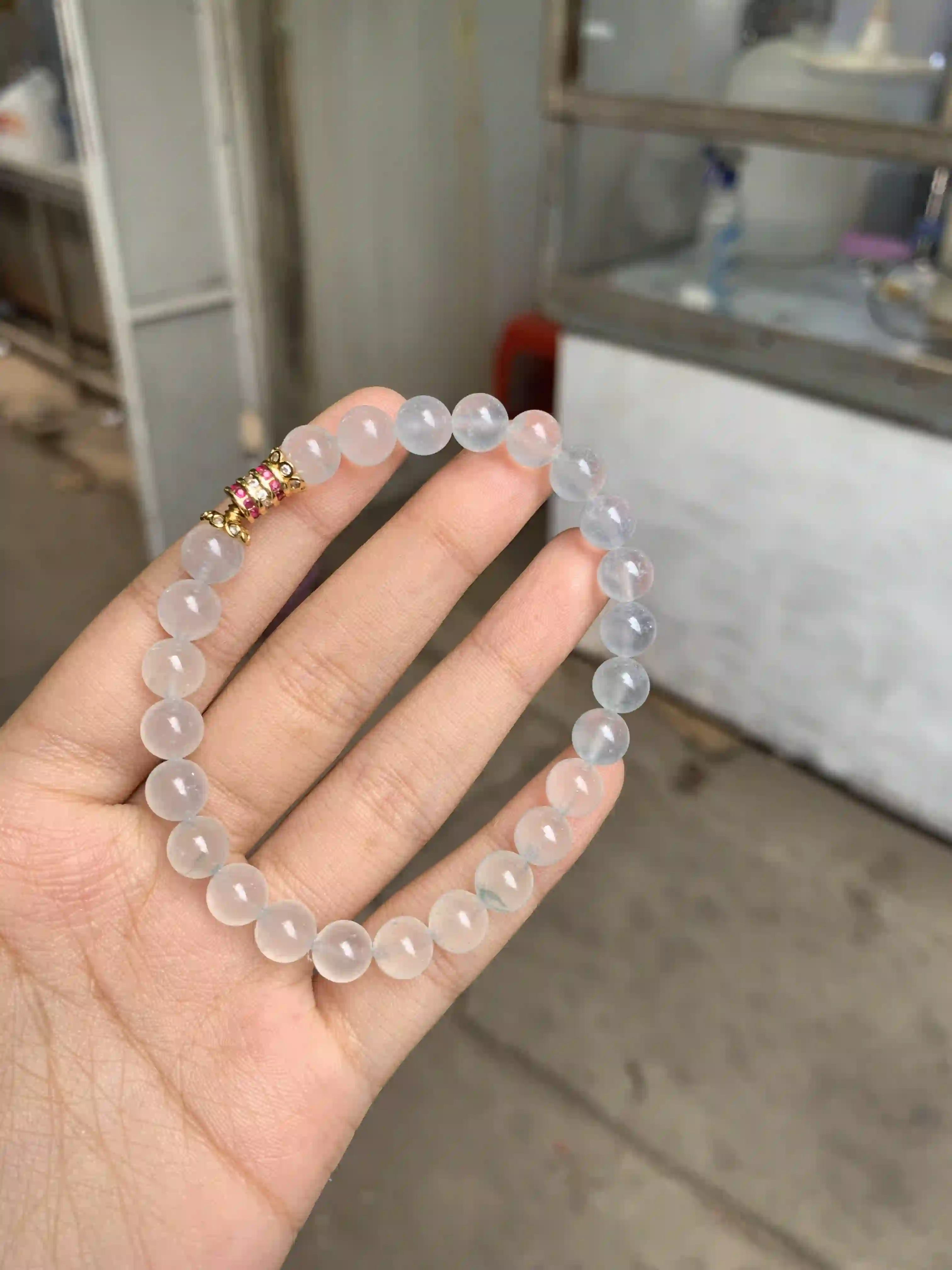 Translucent Clear Jade Bead Bracelet with Decorative Gold-tone Accent | Myanmar Jadeite reference #600002