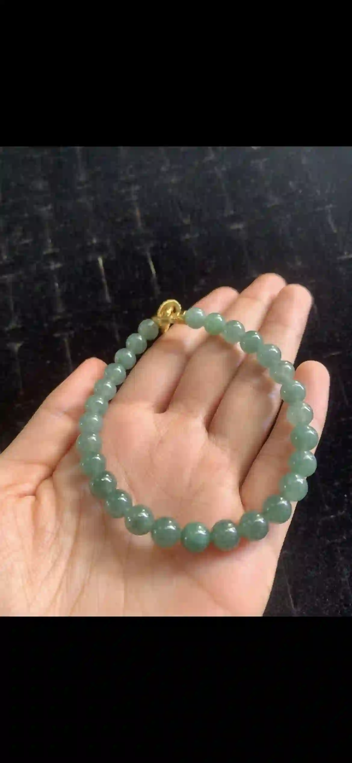 Elegant Deep Icy Green Jadeite Beaded Bracelet with Gold Clasp, view 2 | Myanmar Jadeite reference #23910001
