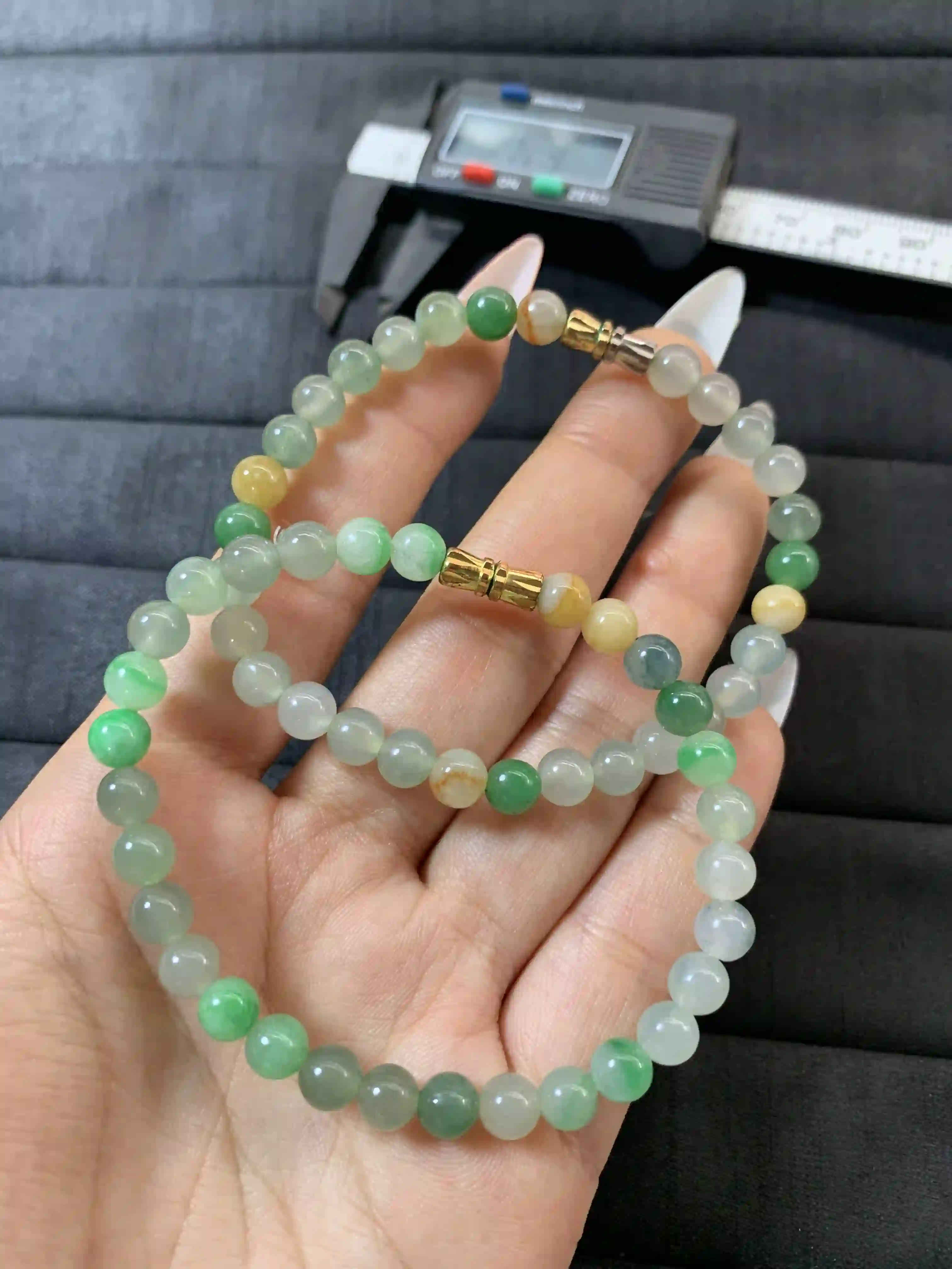Pair of Green and Translucent Jade Beaded Bracelets with Gold Accents, view 2 | Myanmar Jadeite reference #1260007