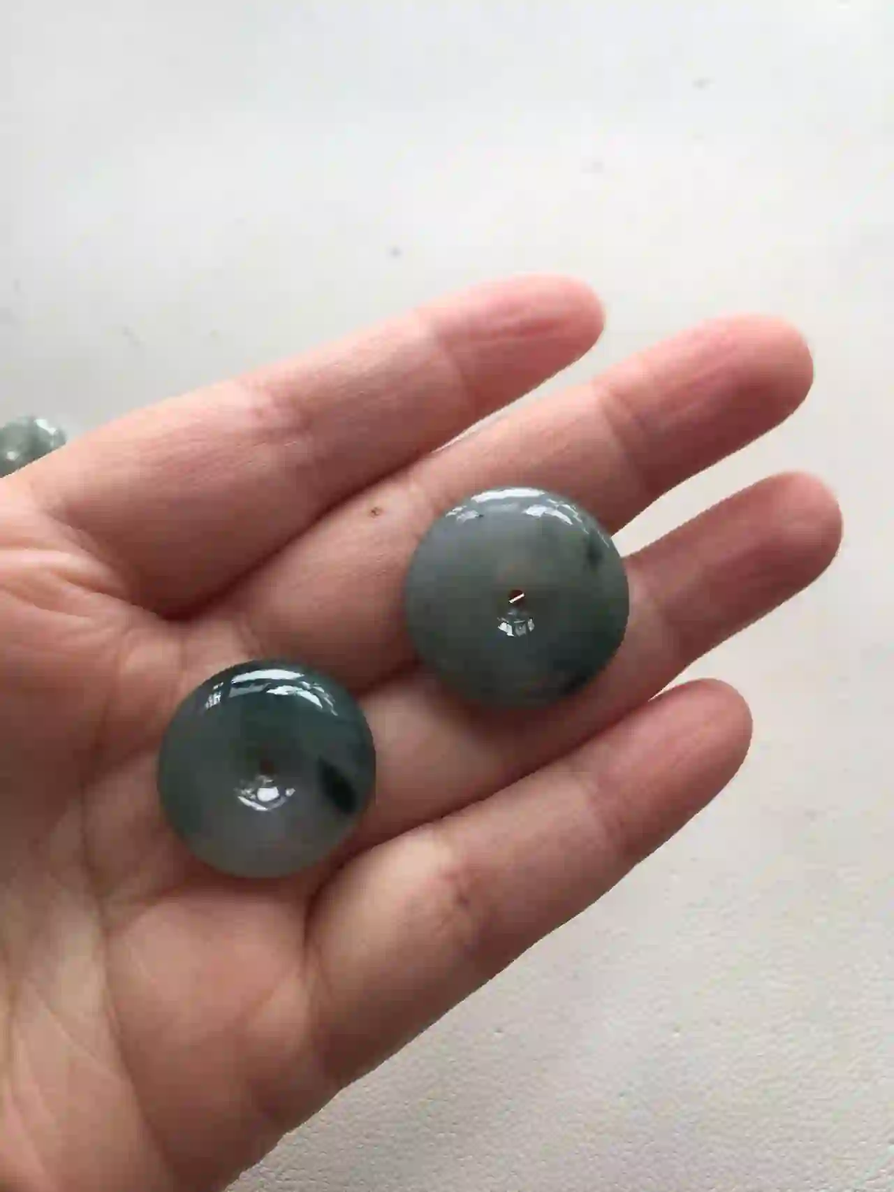 Pair of Green Jade Donut Pendants, view 2 | Myanmar Jadeite reference #2070005