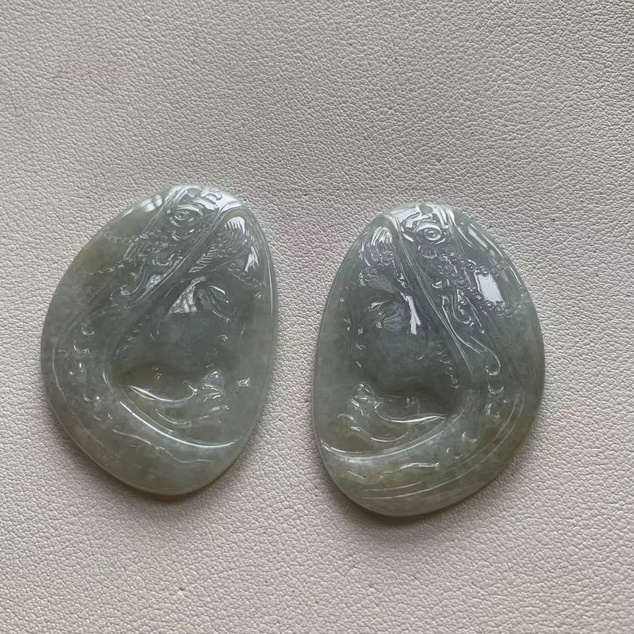 Pair of Icy Green Jade Pendants with Guanyin & Fish Carvings Pair of Icy Green Jade Pendants with Guanyin & Fish Carvings - Burmese Jadeite from Myanmar